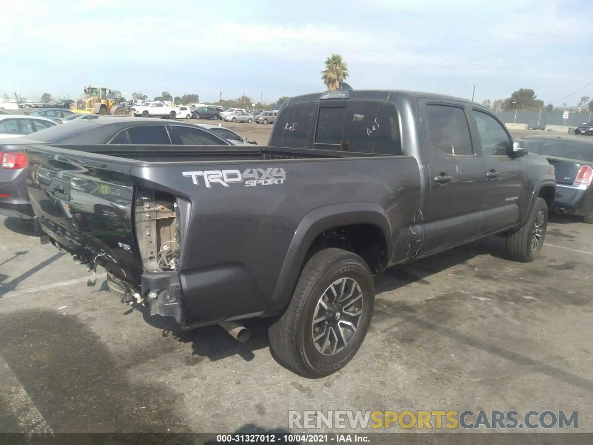 4 Photograph of a damaged car 3TMDZ5BN8LM096006 TOYOTA TACOMA 4WD 2020