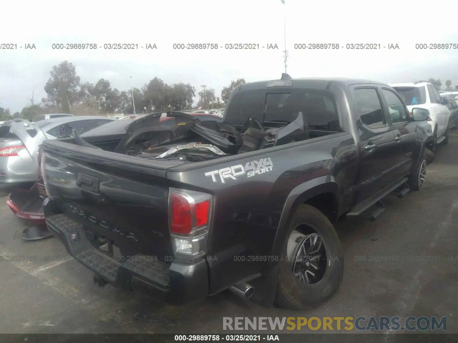 4 Photograph of a damaged car 3TMDZ5BN8LM096393 TOYOTA TACOMA 4WD 2020