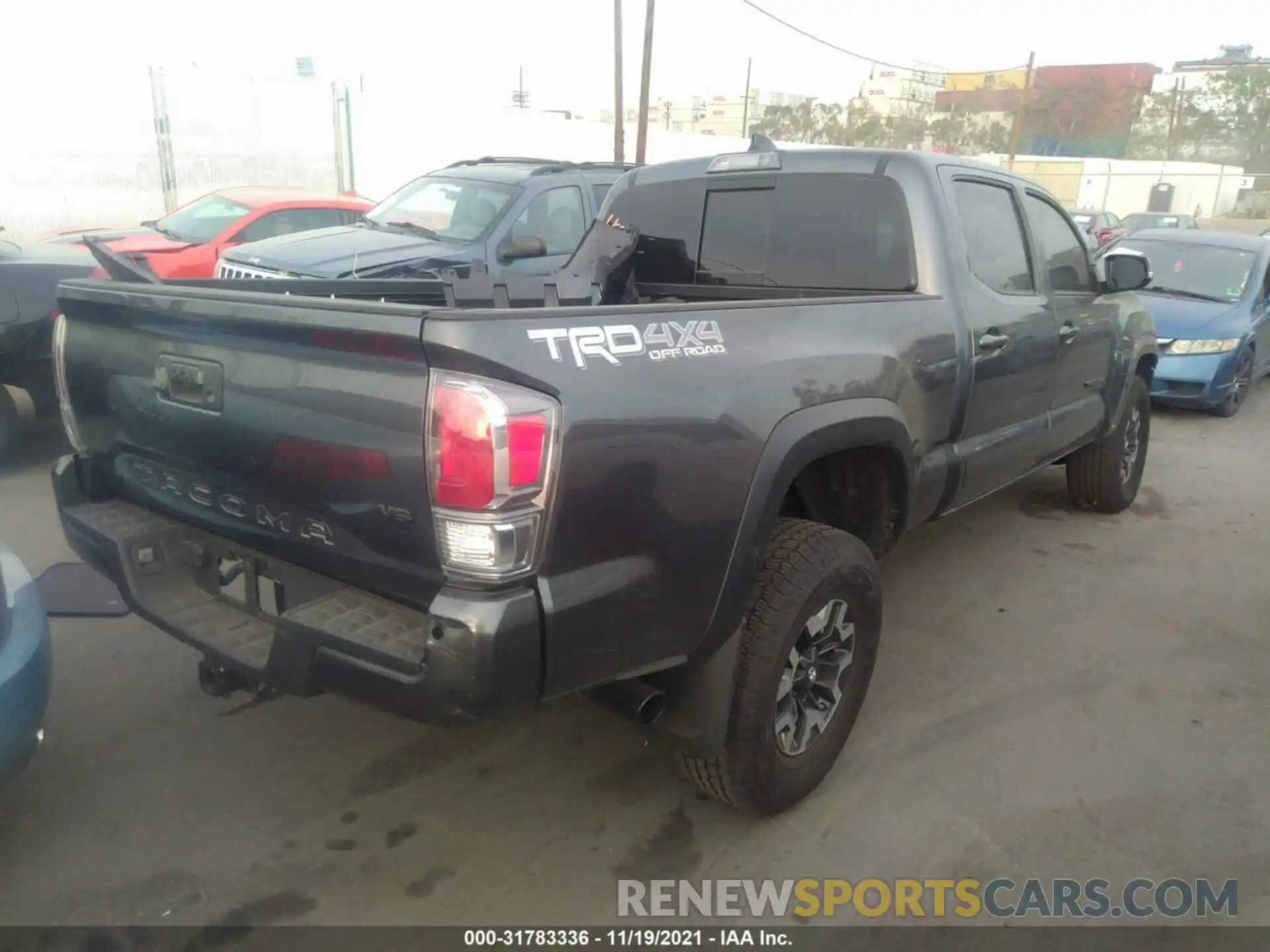 4 Photograph of a damaged car 3TMDZ5BN8LM097429 TOYOTA TACOMA 4WD 2020