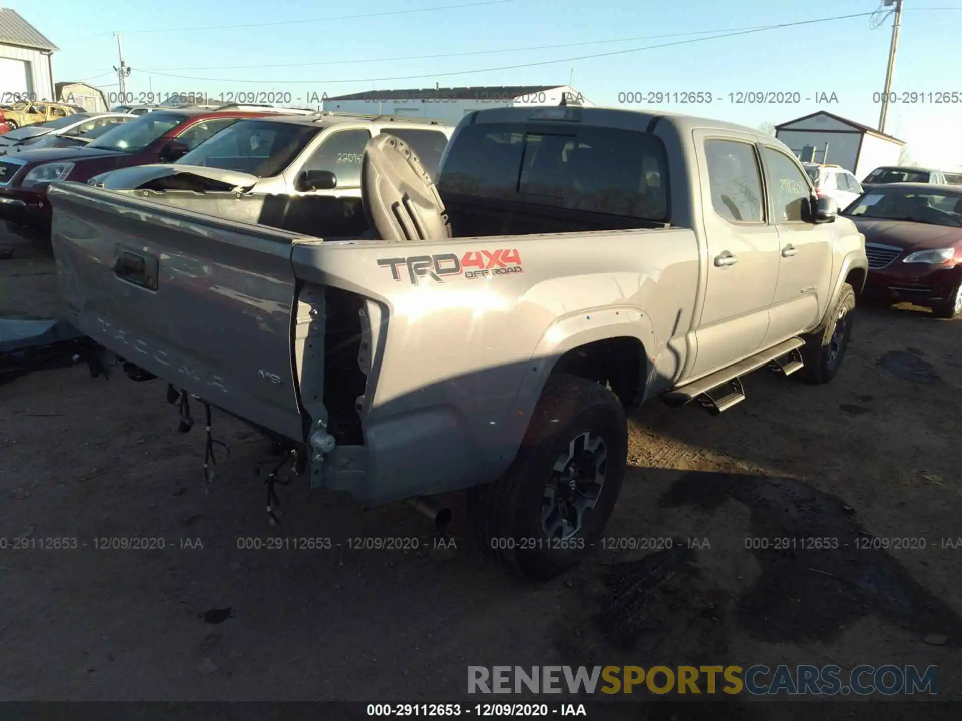 4 Photograph of a damaged car 3TMDZ5BN9LM095947 TOYOTA TACOMA 4WD 2020