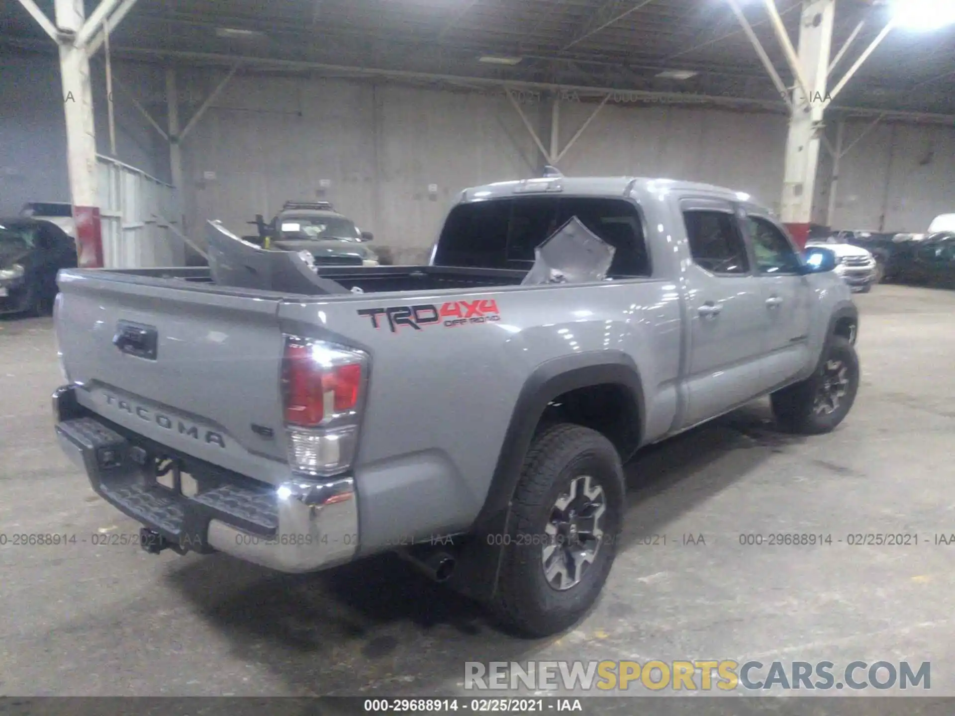 4 Photograph of a damaged car 3TMDZ5BNXLM096525 TOYOTA TACOMA 4WD 2020