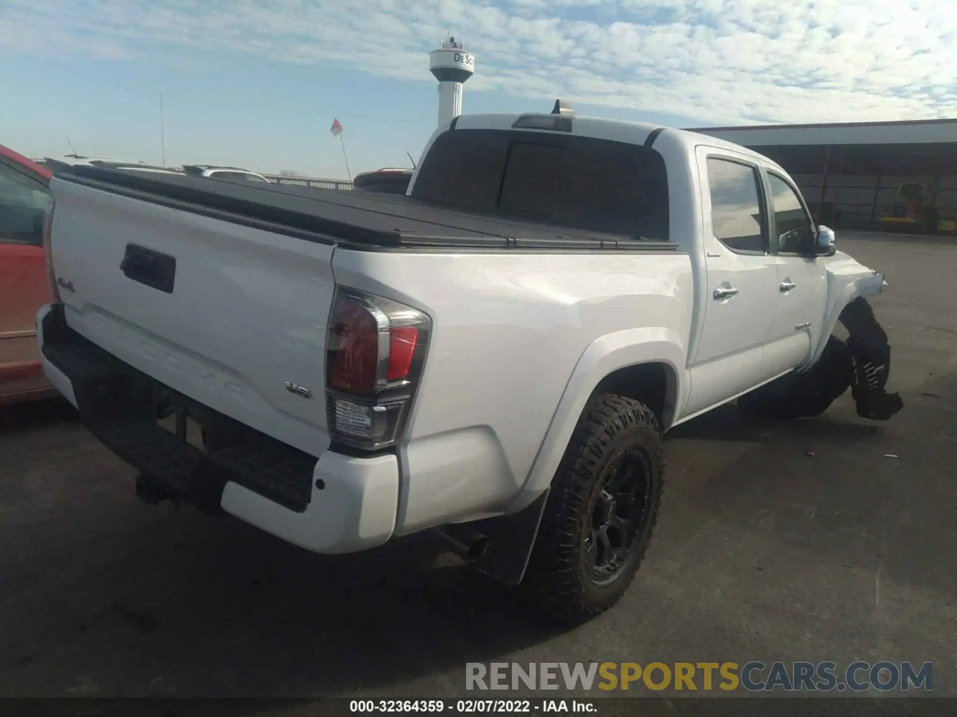 4 Photograph of a damaged car 3TMGZ5AN7LM317741 TOYOTA TACOMA 4WD 2020