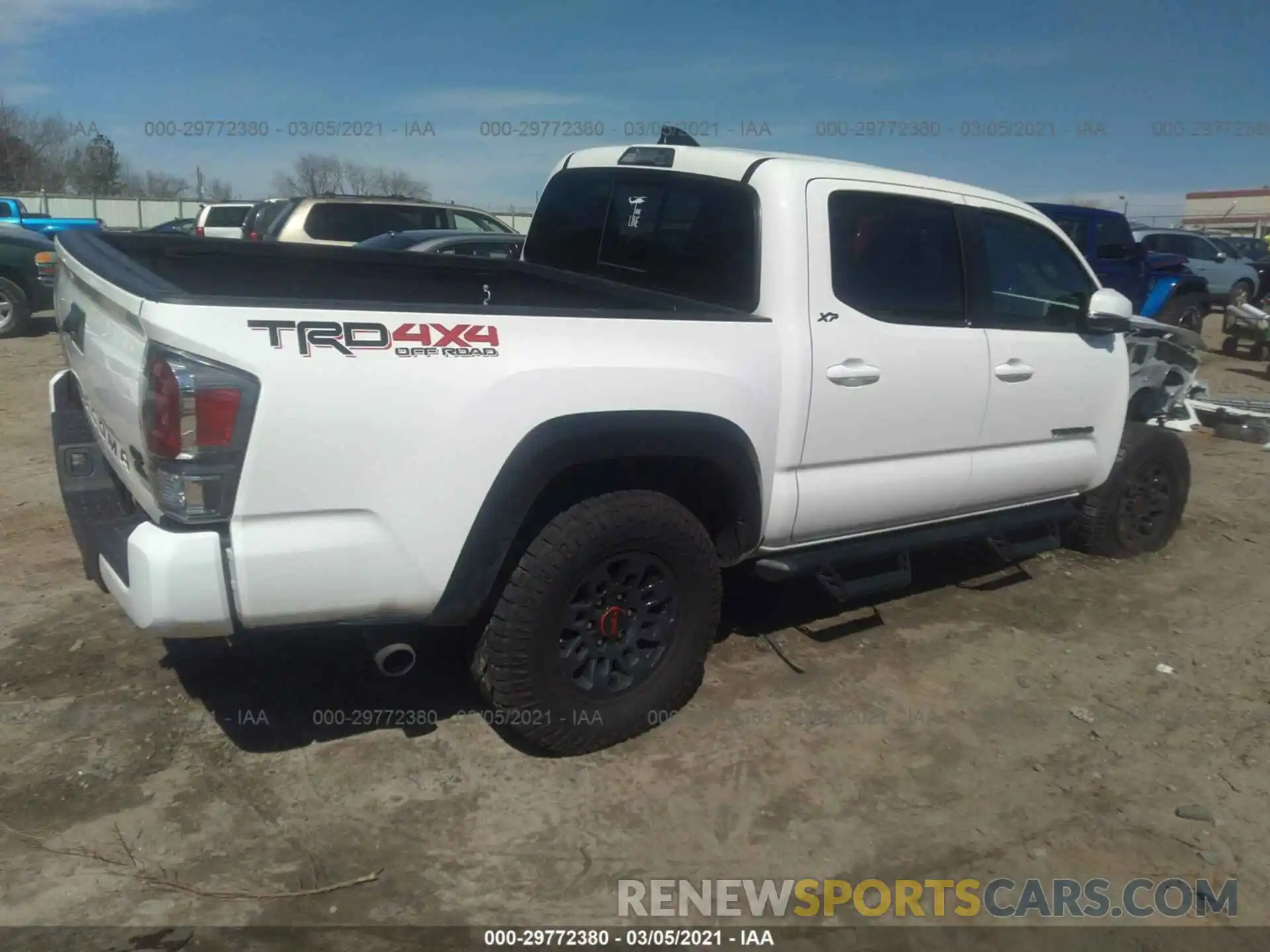 4 Photograph of a damaged car 3TYCZ5AN0LT003030 TOYOTA TACOMA 4WD 2020