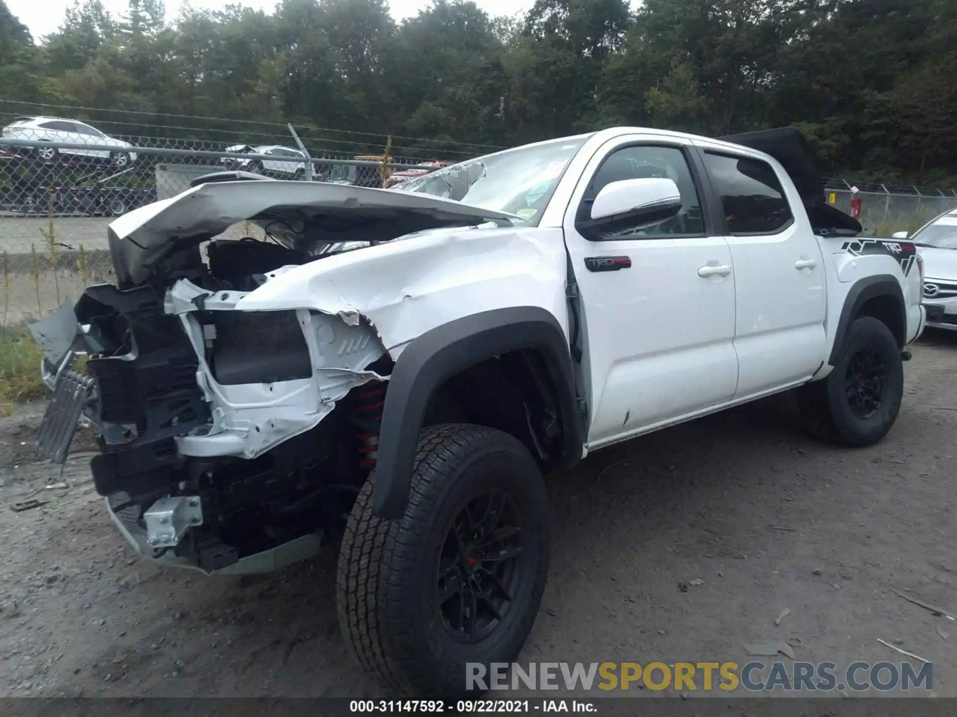 2 Photograph of a damaged car 5TFCZ5AN0LX217781 TOYOTA TACOMA 4WD 2020