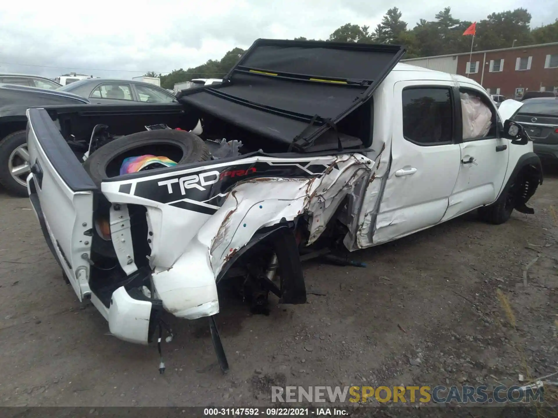 4 Photograph of a damaged car 5TFCZ5AN0LX217781 TOYOTA TACOMA 4WD 2020