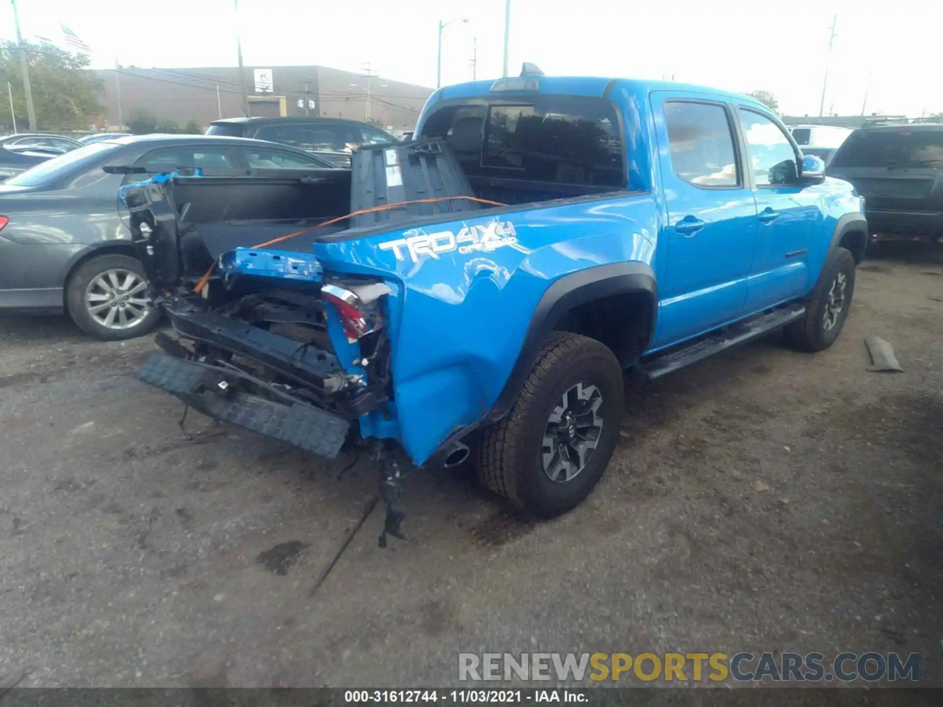 4 Photograph of a damaged car 5TFCZ5AN0LX242471 TOYOTA TACOMA 4WD 2020