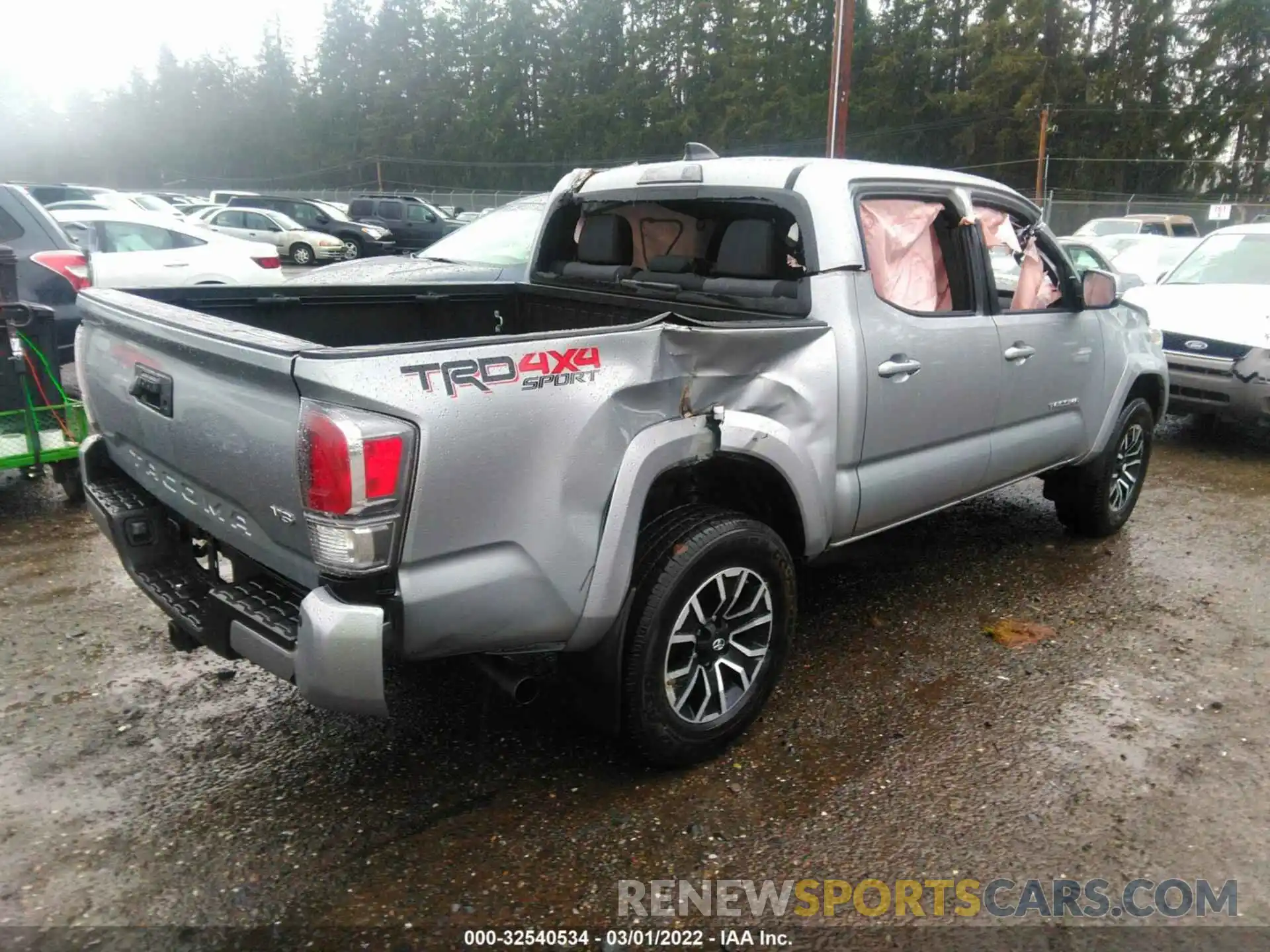 4 Photograph of a damaged car 5TFCZ5AN1LX220821 TOYOTA TACOMA 4WD 2020