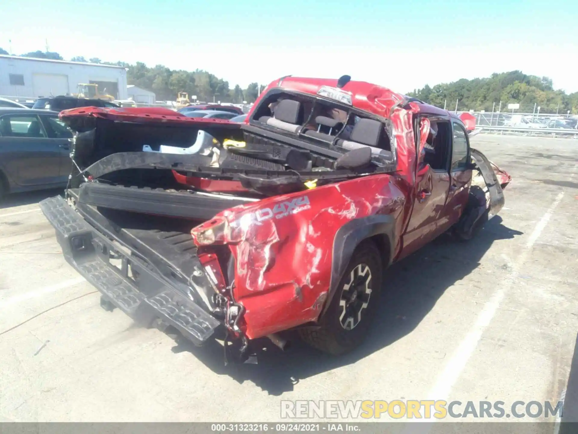 4 Photograph of a damaged car 5TFCZ5AN1LX242513 TOYOTA TACOMA 4WD 2020