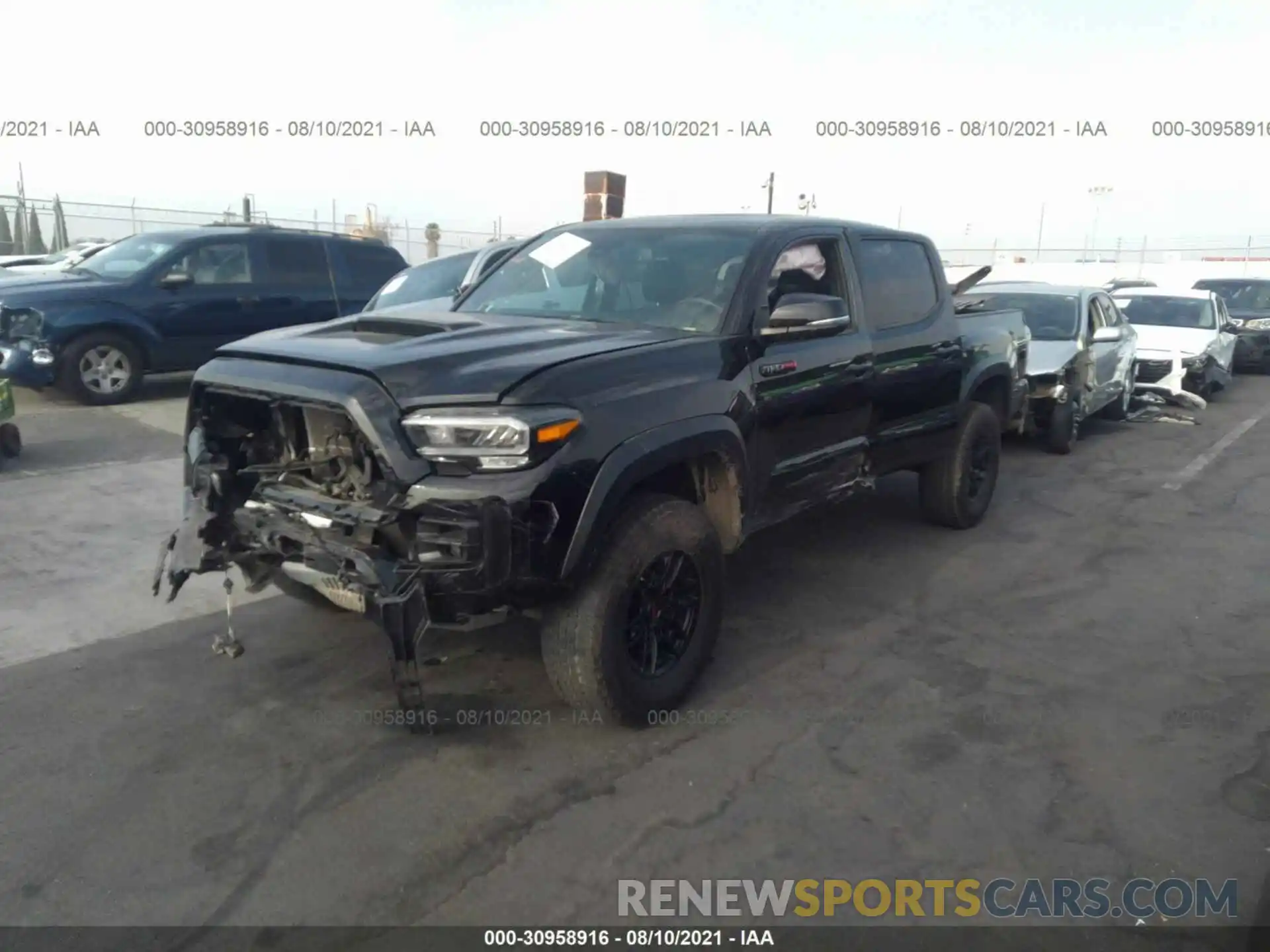 2 Photograph of a damaged car 5TFCZ5AN2LX233593 TOYOTA TACOMA 4WD 2020