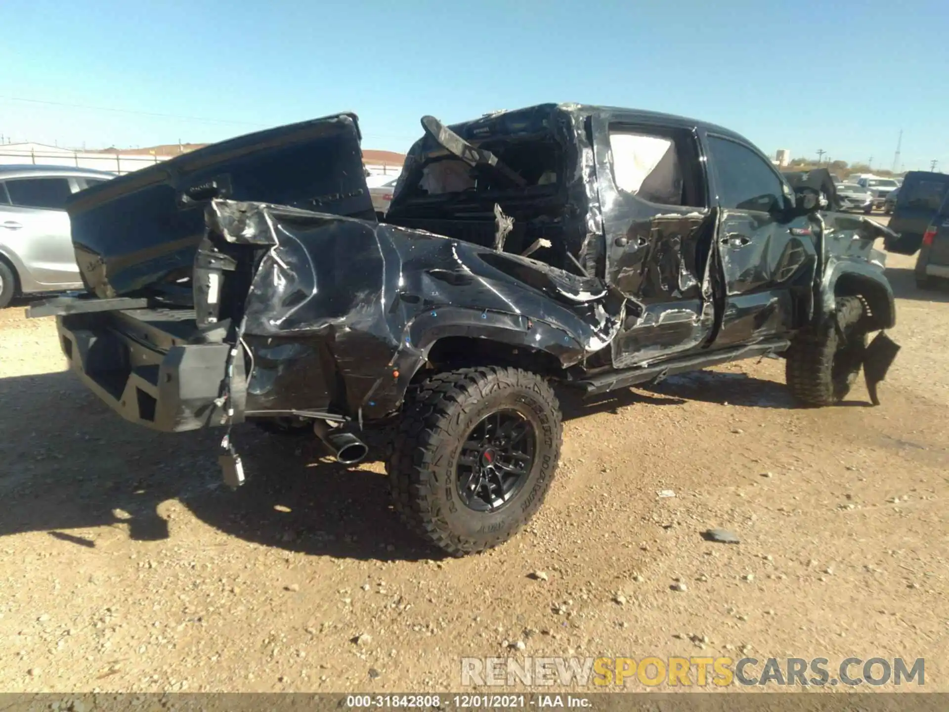 4 Photograph of a damaged car 5TFCZ5AN2LX236283 TOYOTA TACOMA 4WD 2020