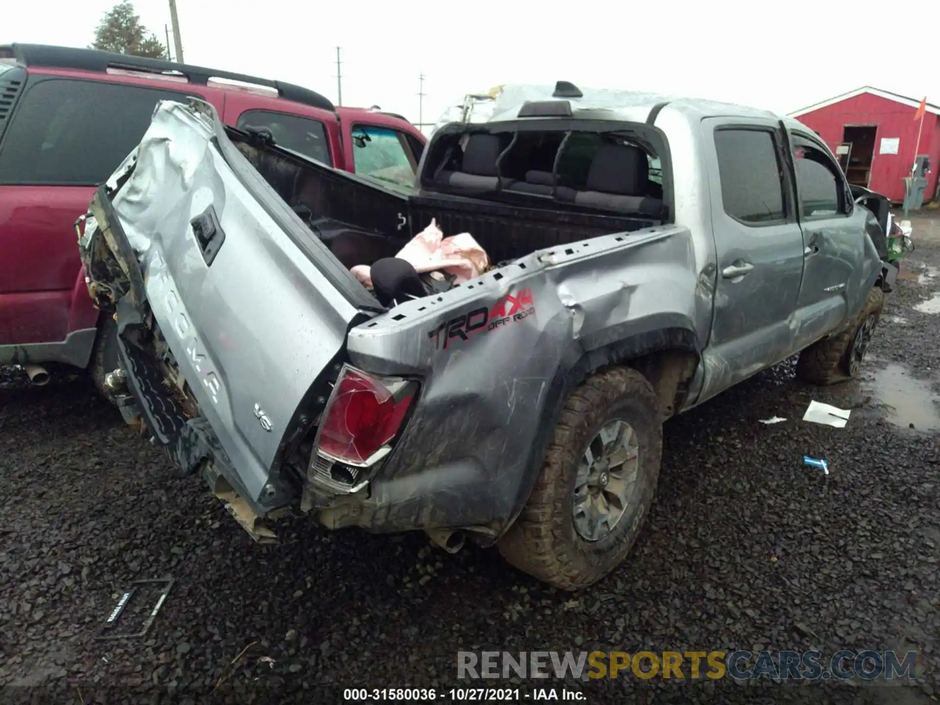 4 Photograph of a damaged car 5TFCZ5AN4LX218545 TOYOTA TACOMA 4WD 2020