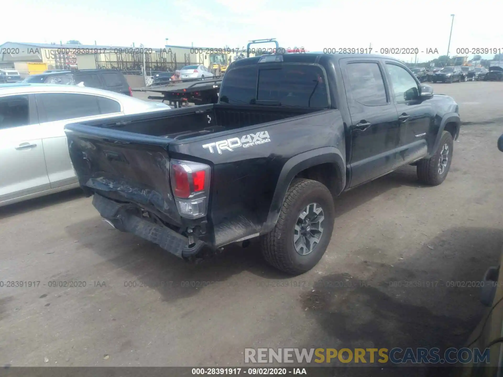 4 Photograph of a damaged car 5TFCZ5AN7LX214652 TOYOTA TACOMA 4WD 2020