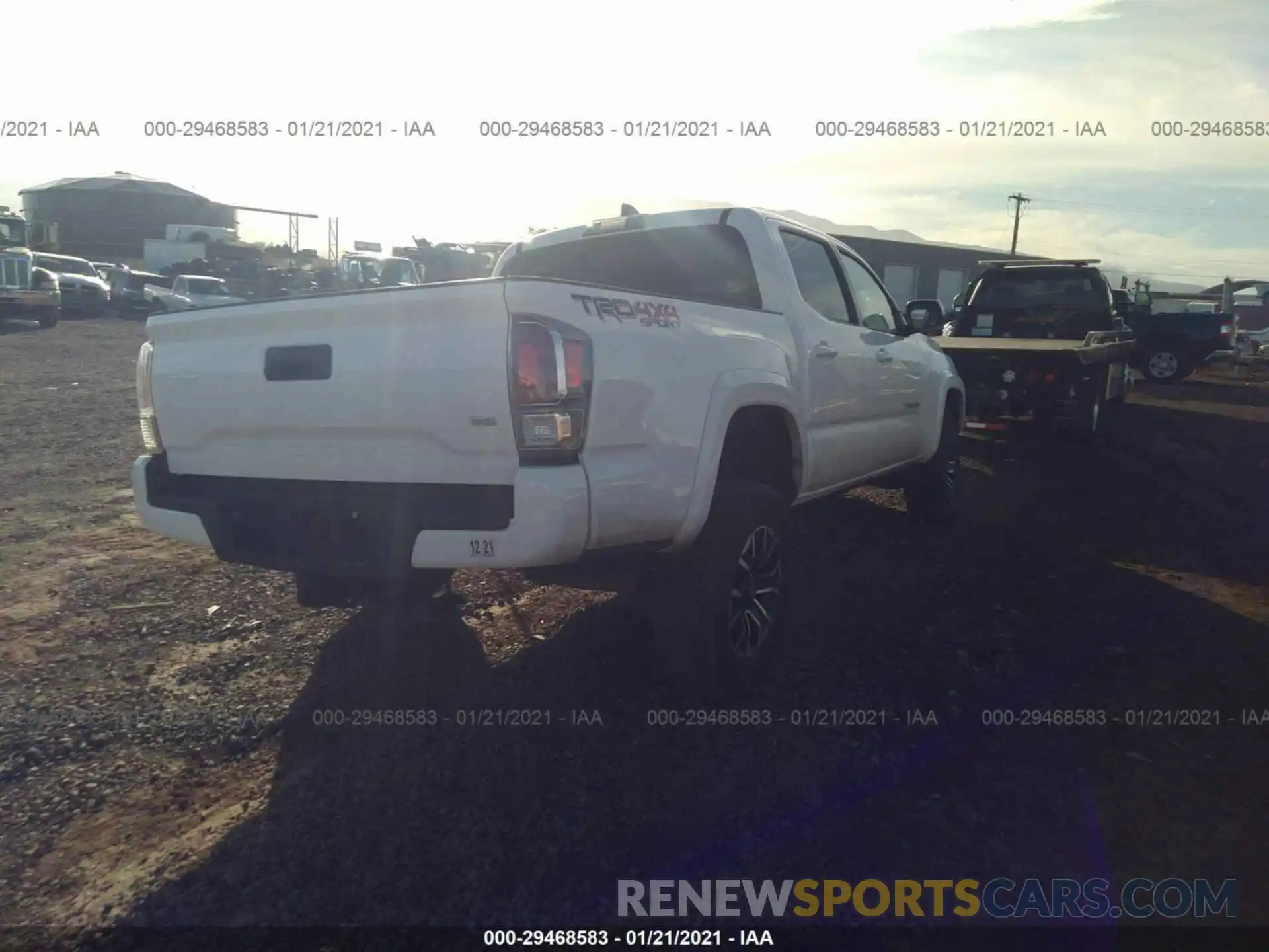 4 Photograph of a damaged car 5TFCZ5AN7LX216644 TOYOTA TACOMA 4WD 2020