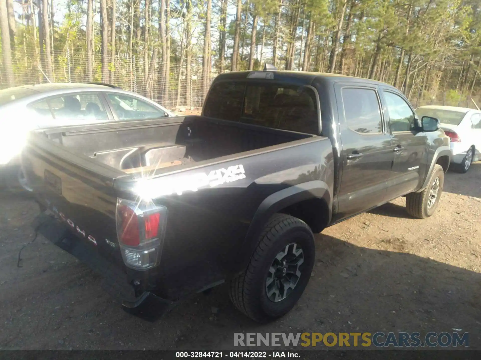 4 Photograph of a damaged car 5TFCZ5AN7LX230897 TOYOTA TACOMA 4WD 2020