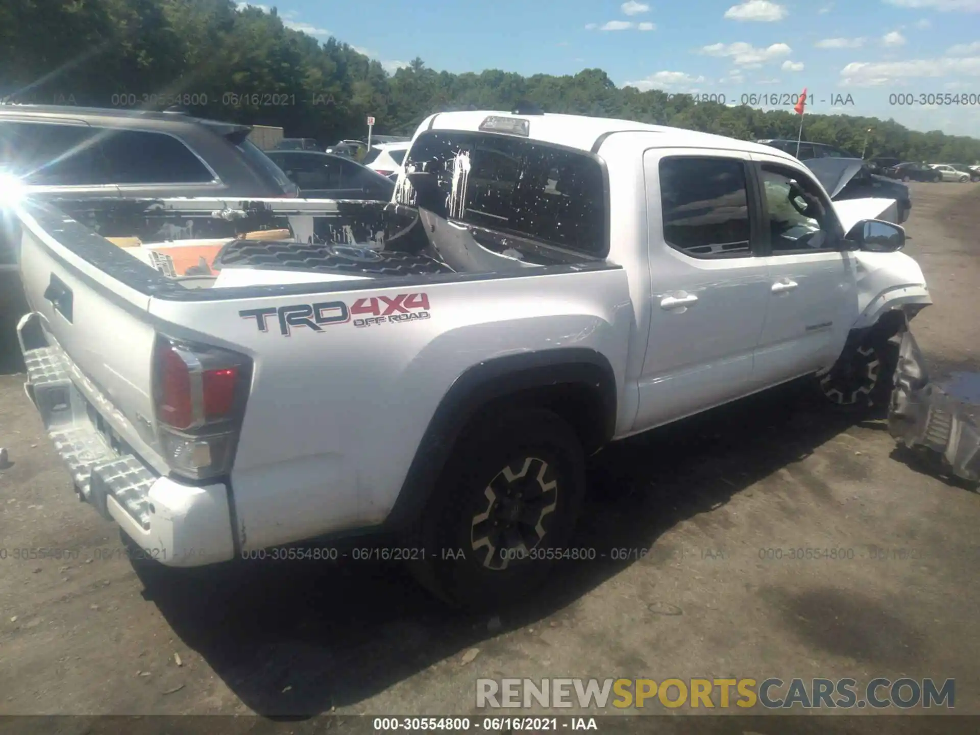 4 Photograph of a damaged car 5TFCZ5AN7LX234240 TOYOTA TACOMA 4WD 2020