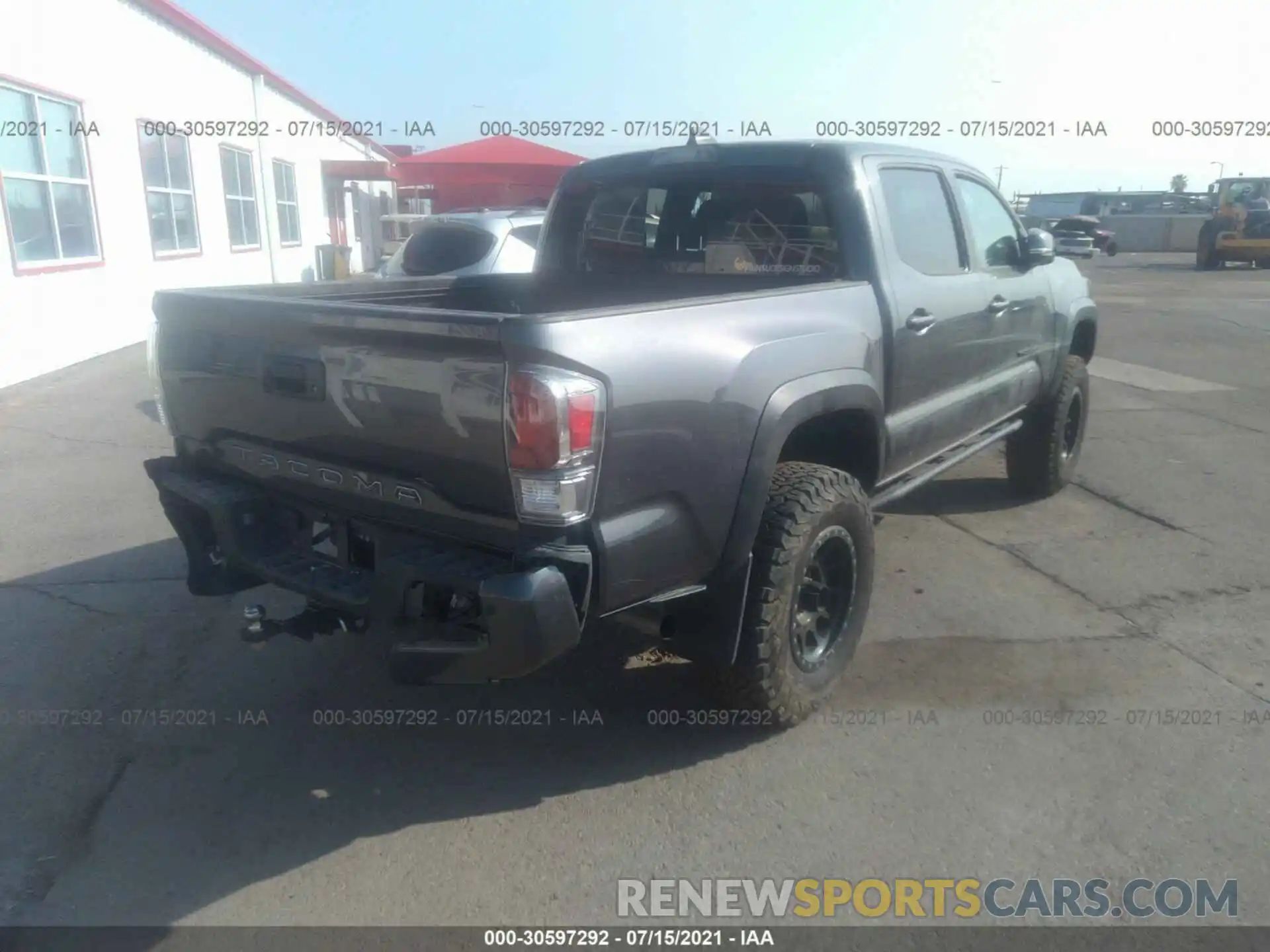 4 Photograph of a damaged car 5TFCZ5AN7LX242306 TOYOTA TACOMA 4WD 2020