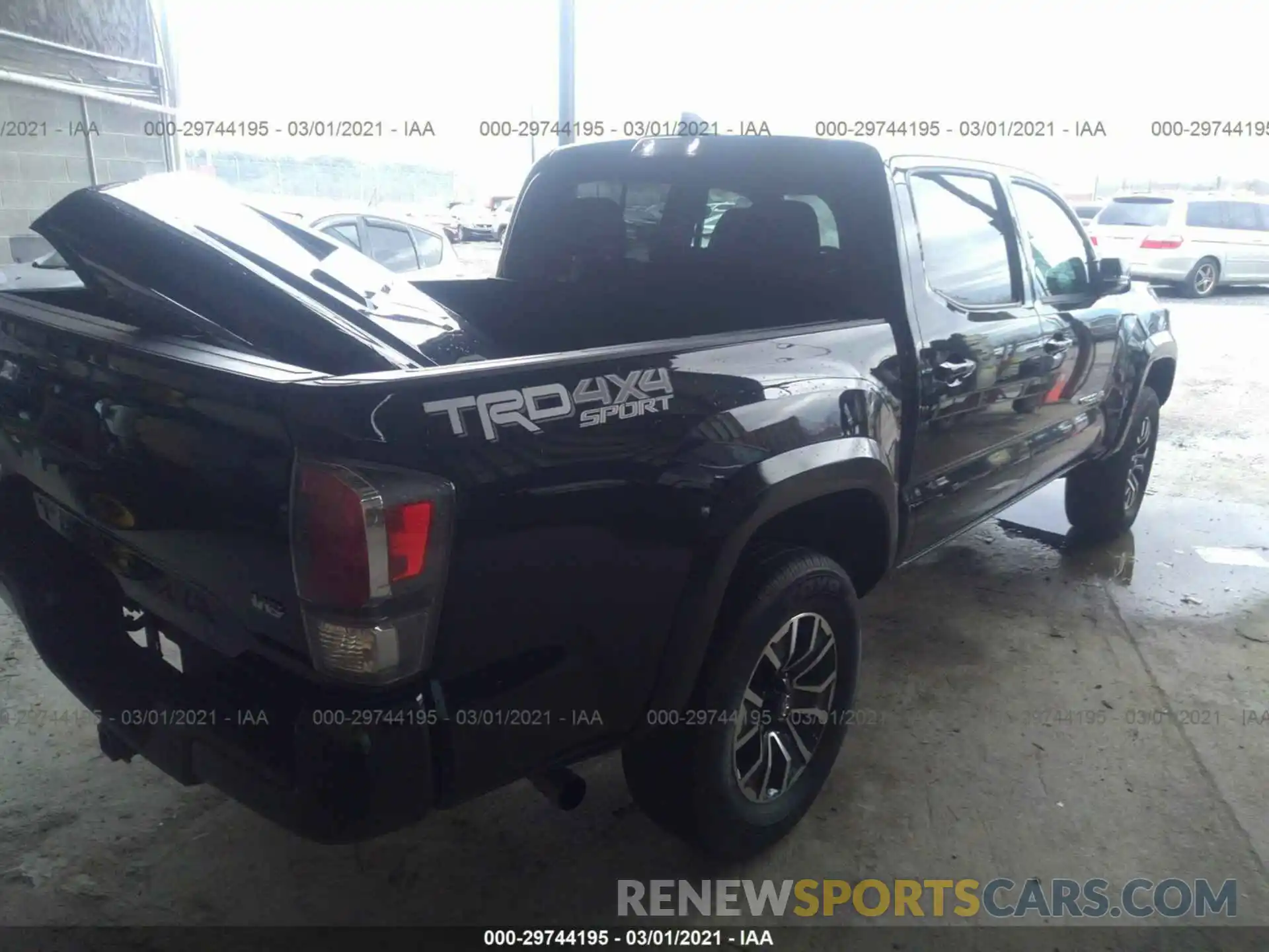 4 Photograph of a damaged car 5TFCZ5AN8LX230603 TOYOTA TACOMA 4WD 2020