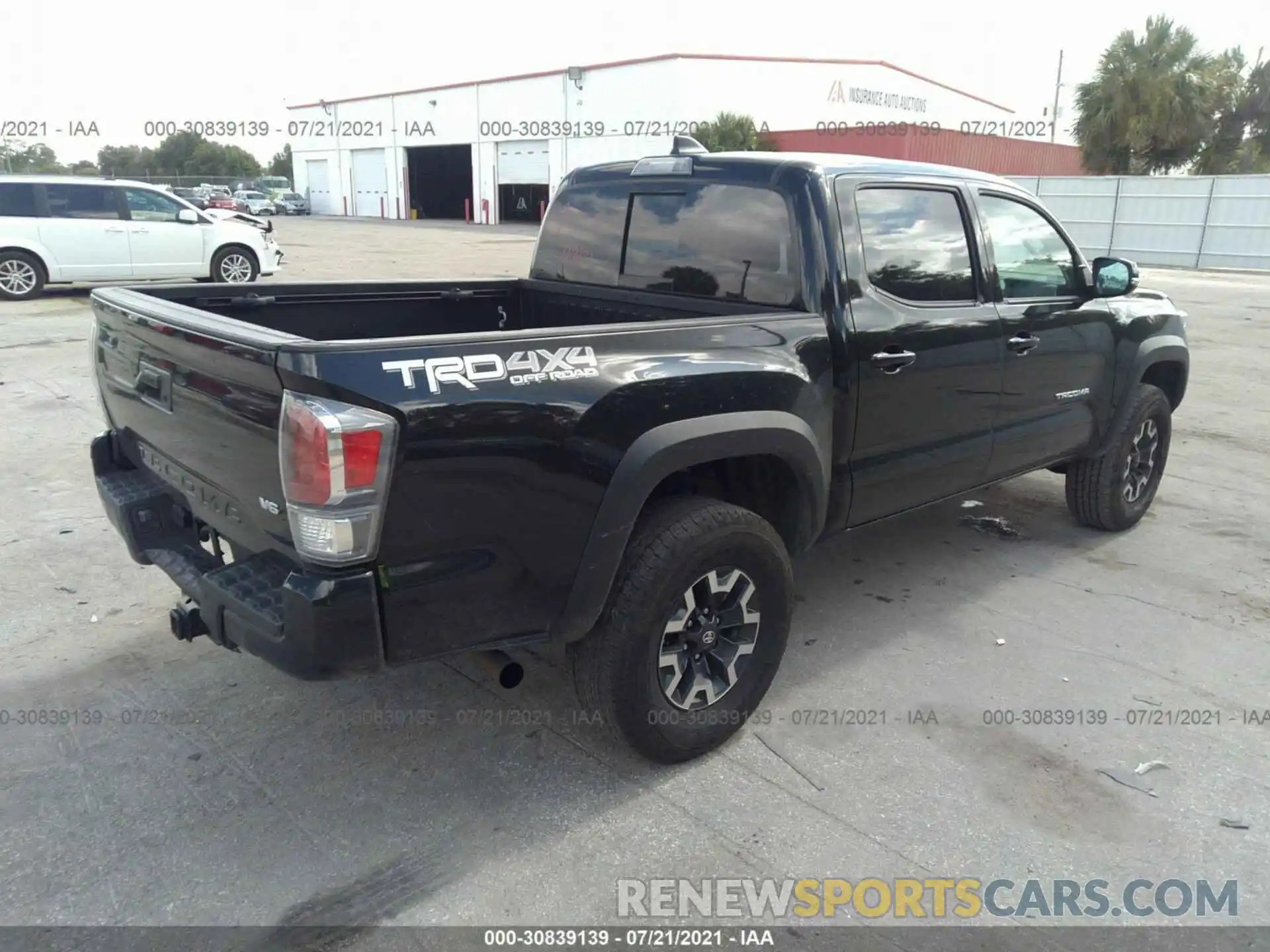 4 Photograph of a damaged car 5TFCZ5AN9LX228584 TOYOTA TACOMA 4WD 2020