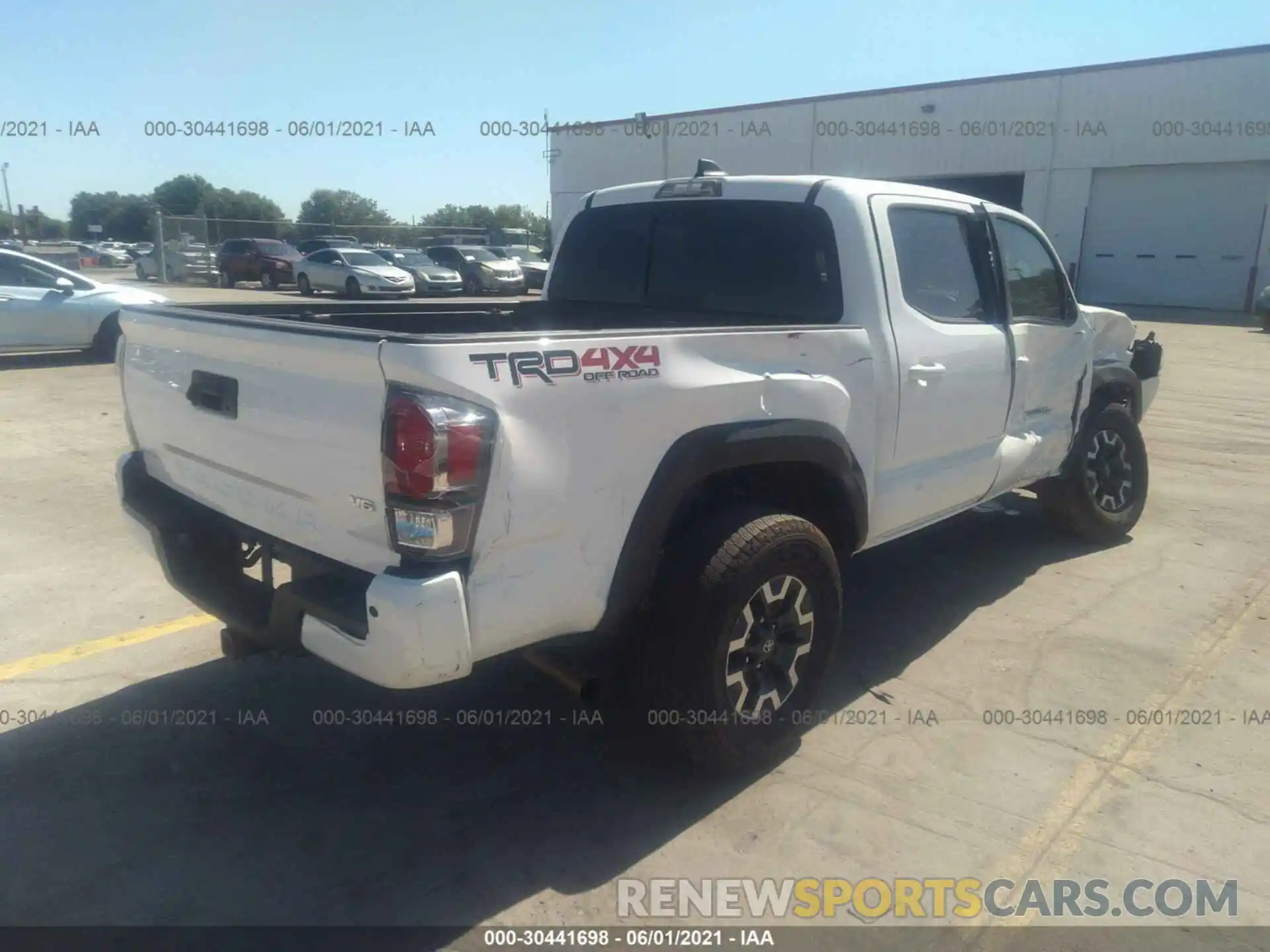 4 Photograph of a damaged car 5TFCZ5AN9LX230688 TOYOTA TACOMA 4WD 2020