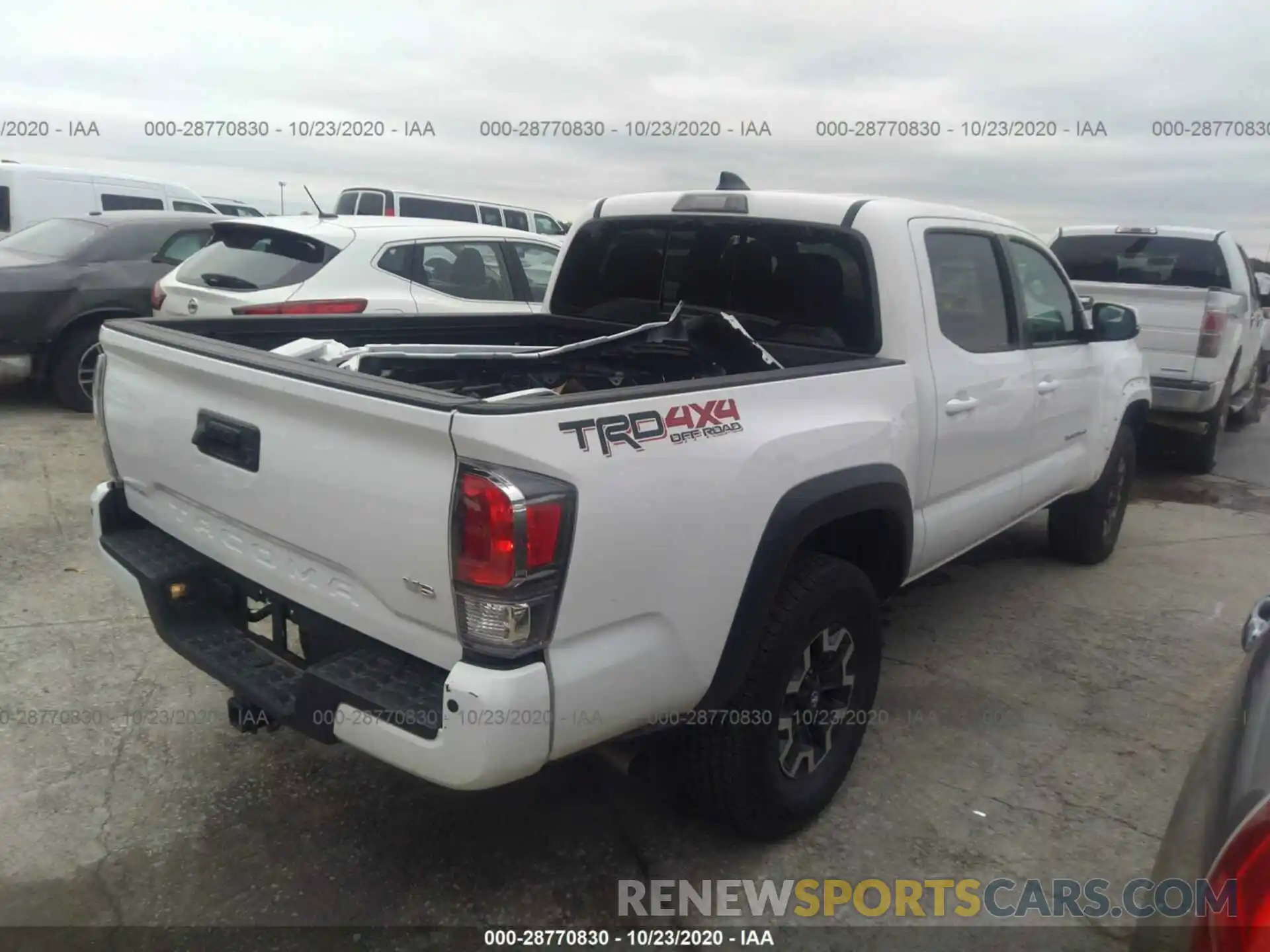 4 Photograph of a damaged car 5TFCZ5AN9LX230710 TOYOTA TACOMA 4WD 2020