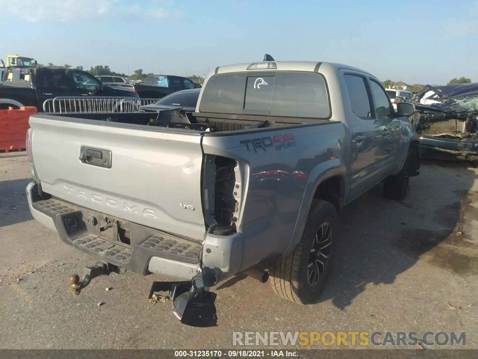 4 Photograph of a damaged car 5TFCZ5AN9LX234921 TOYOTA TACOMA 4WD 2020