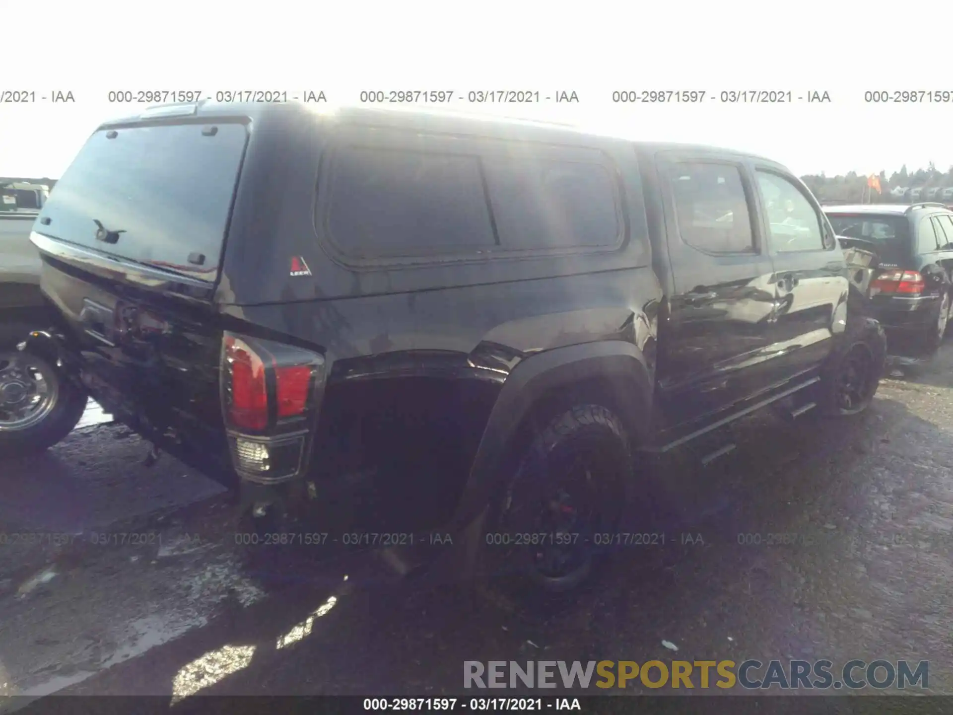 4 Photograph of a damaged car 5TFCZ5AN9LX237849 TOYOTA TACOMA 4WD 2020