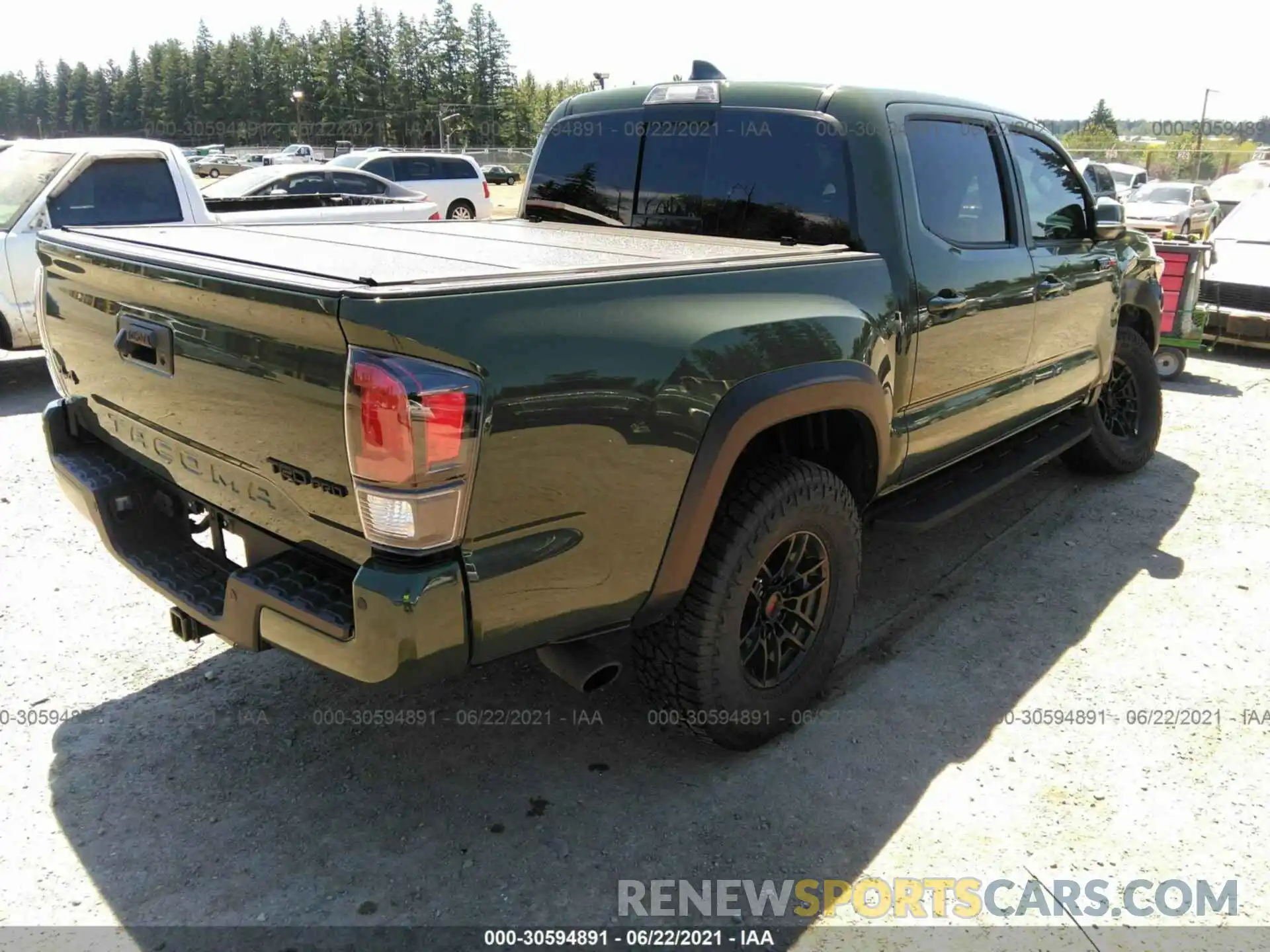 4 Photograph of a damaged car 5TFCZ5AN9LX243845 TOYOTA TACOMA 4WD 2020