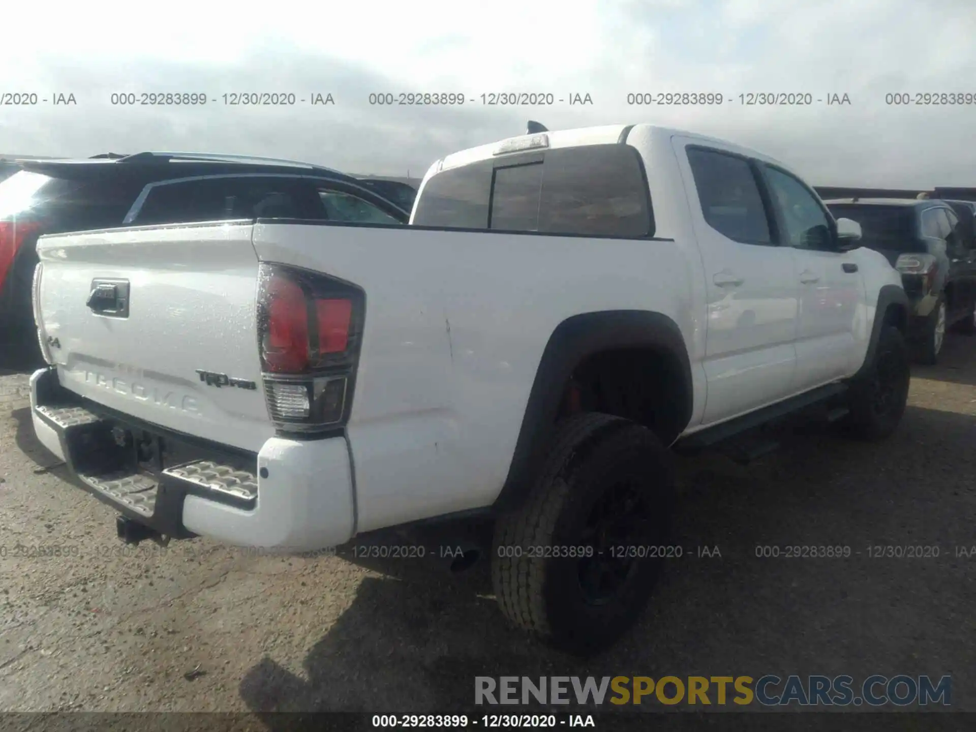 4 Photograph of a damaged car 5TFCZ5ANXLX231879 TOYOTA TACOMA 4WD 2020