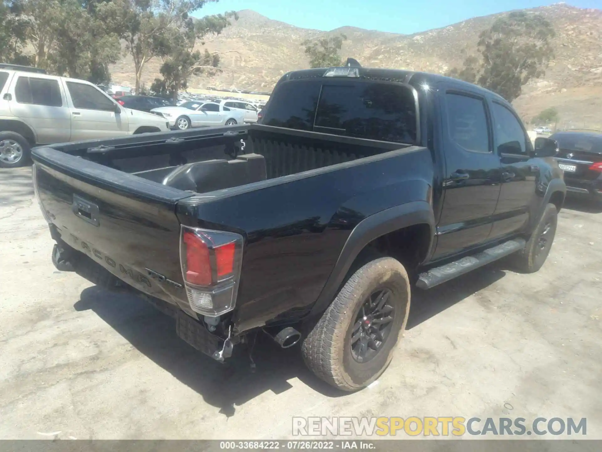 4 Photograph of a damaged car 5TFCZ5ANXLX237889 TOYOTA TACOMA 4WD 2020