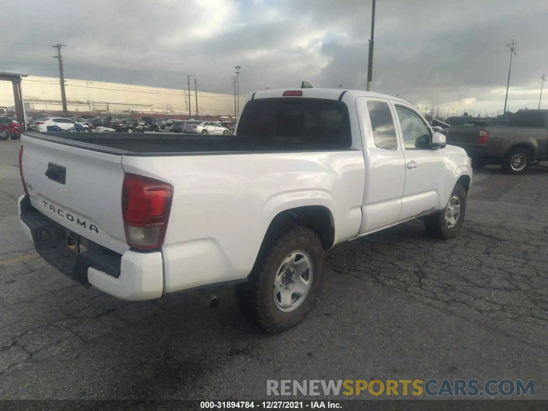 4 Photograph of a damaged car 5TFSX5EN8LX072145 TOYOTA TACOMA 4WD 2020