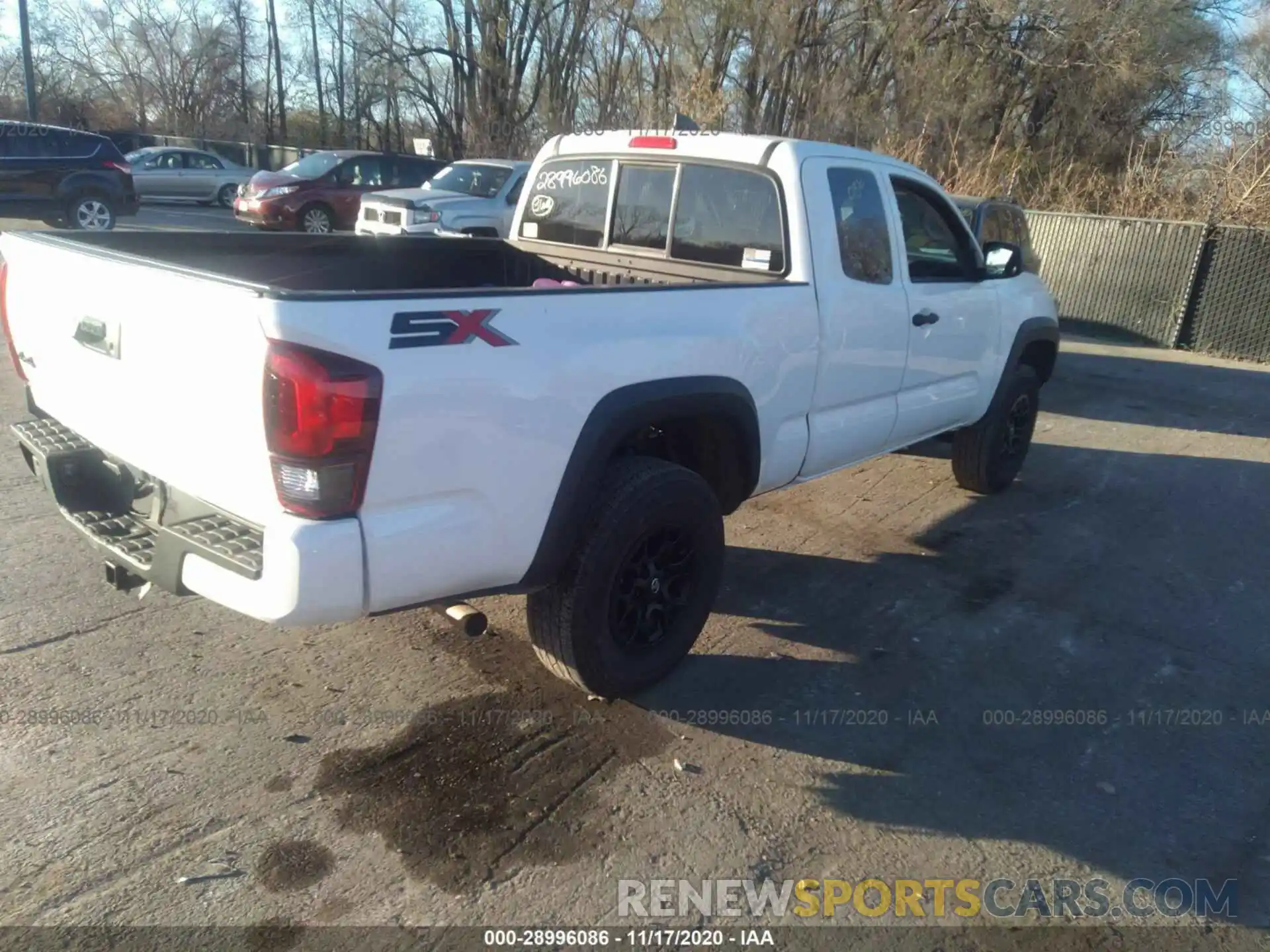 4 Photograph of a damaged car 5TFSZ5AN5LX212393 TOYOTA TACOMA 4WD 2020