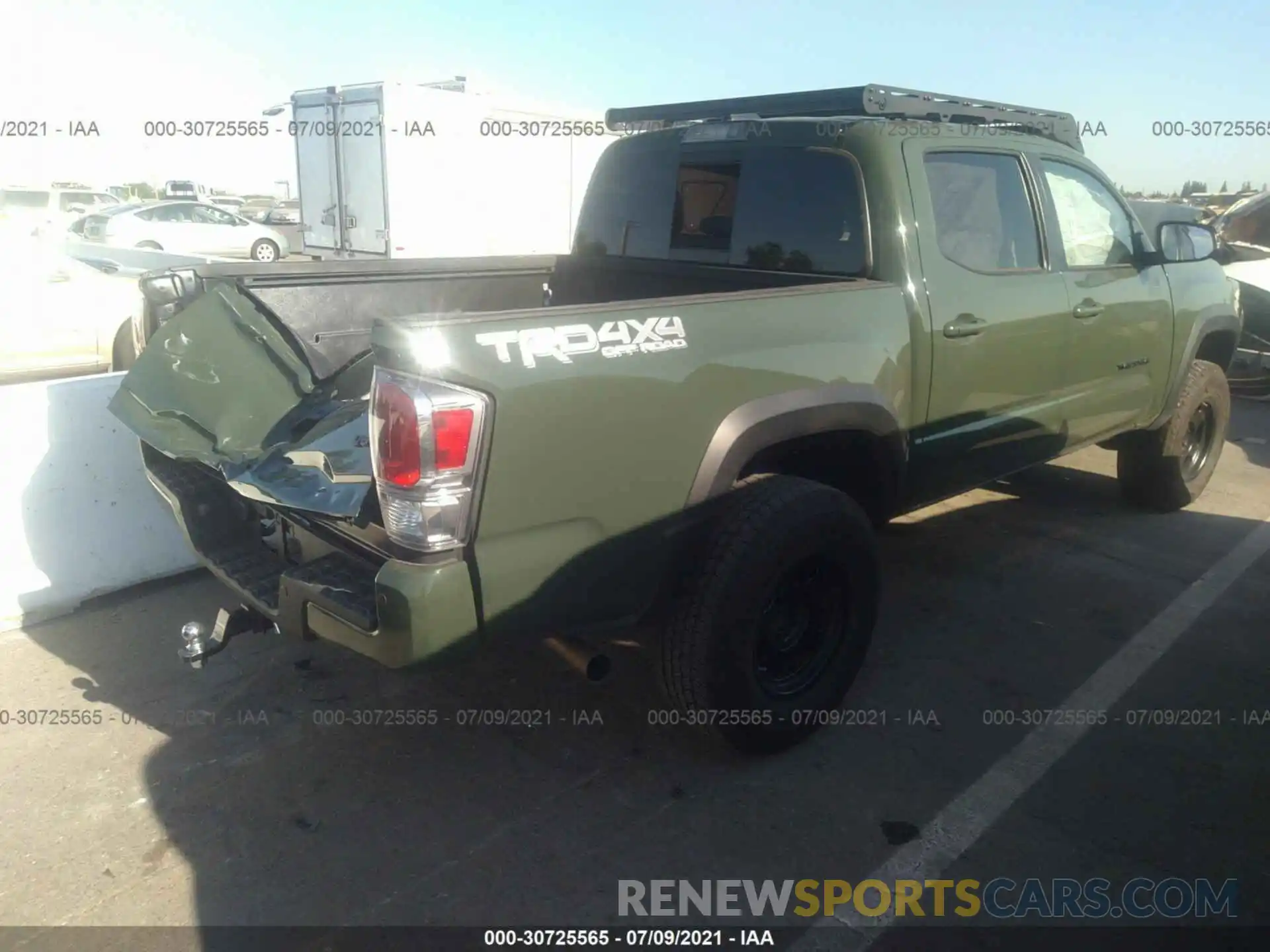 4 Photograph of a damaged car 3TMCZ5AN0MM371575 TOYOTA TACOMA 4WD 2021