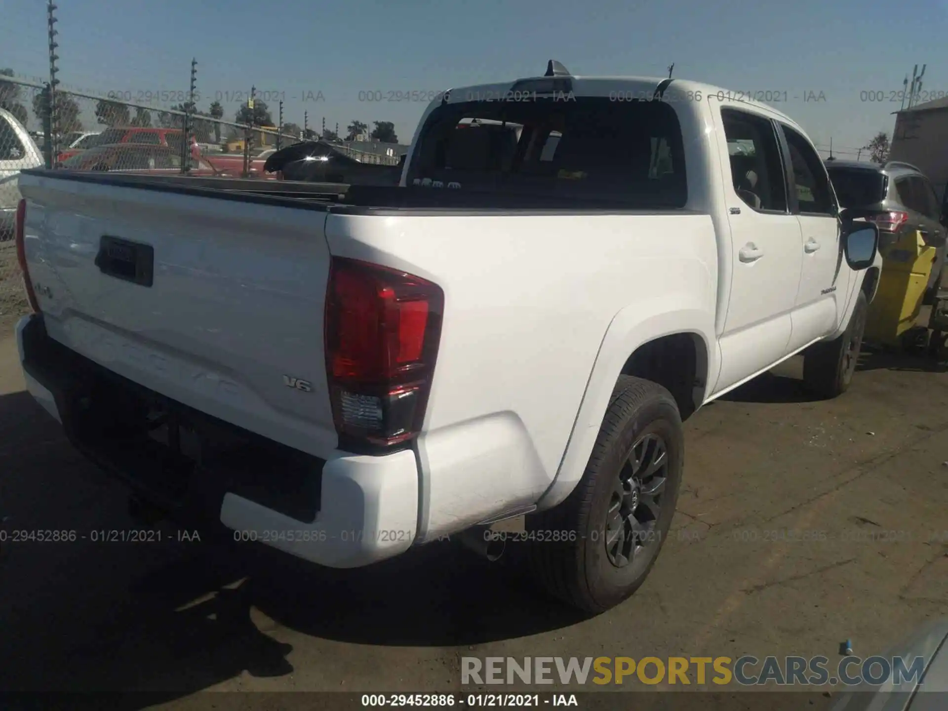 4 Photograph of a damaged car 3TMCZ5AN0MM384942 TOYOTA TACOMA 4WD 2021