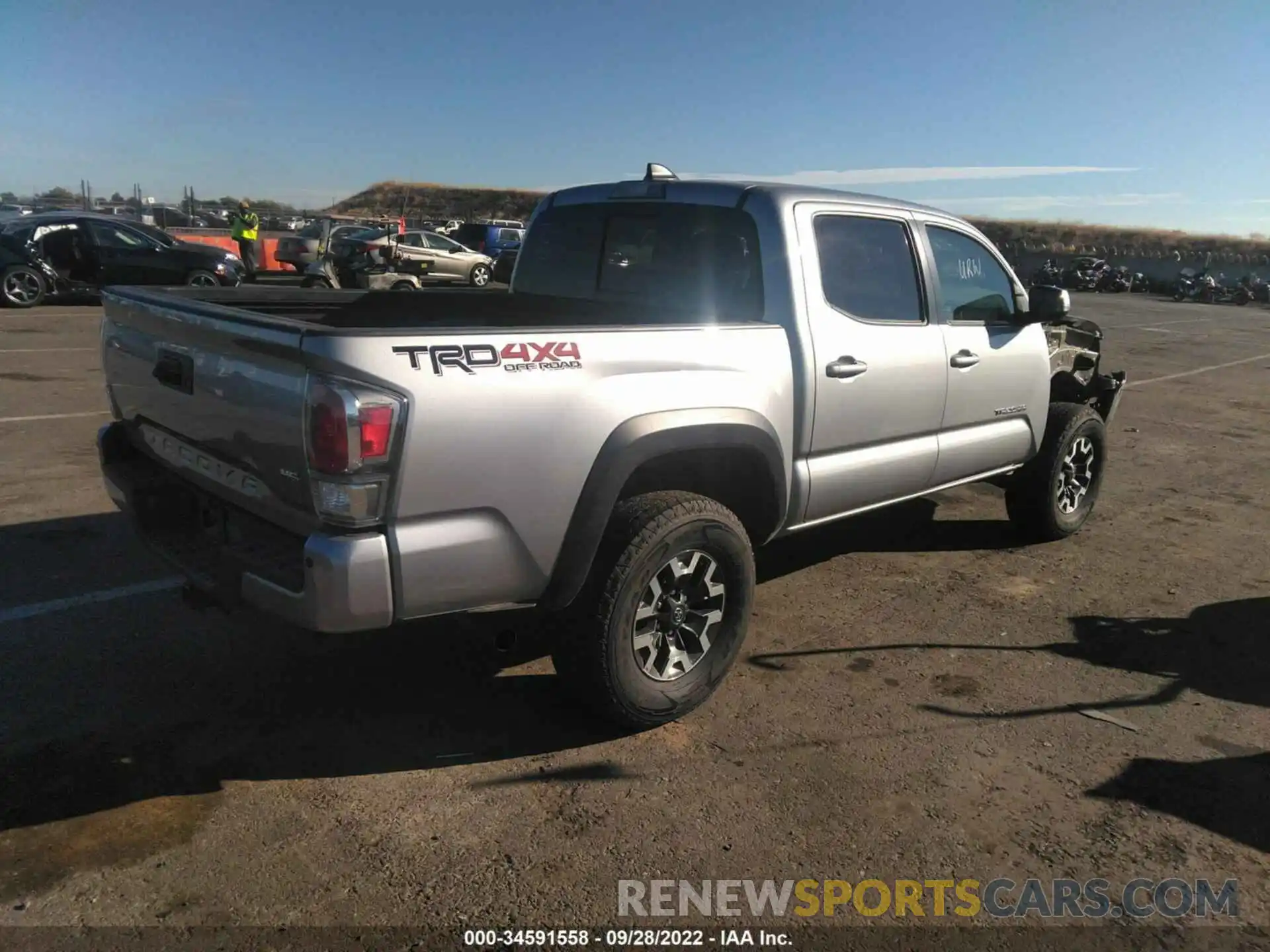 4 Photograph of a damaged car 3TMCZ5AN0MM401724 TOYOTA TACOMA 4WD 2021