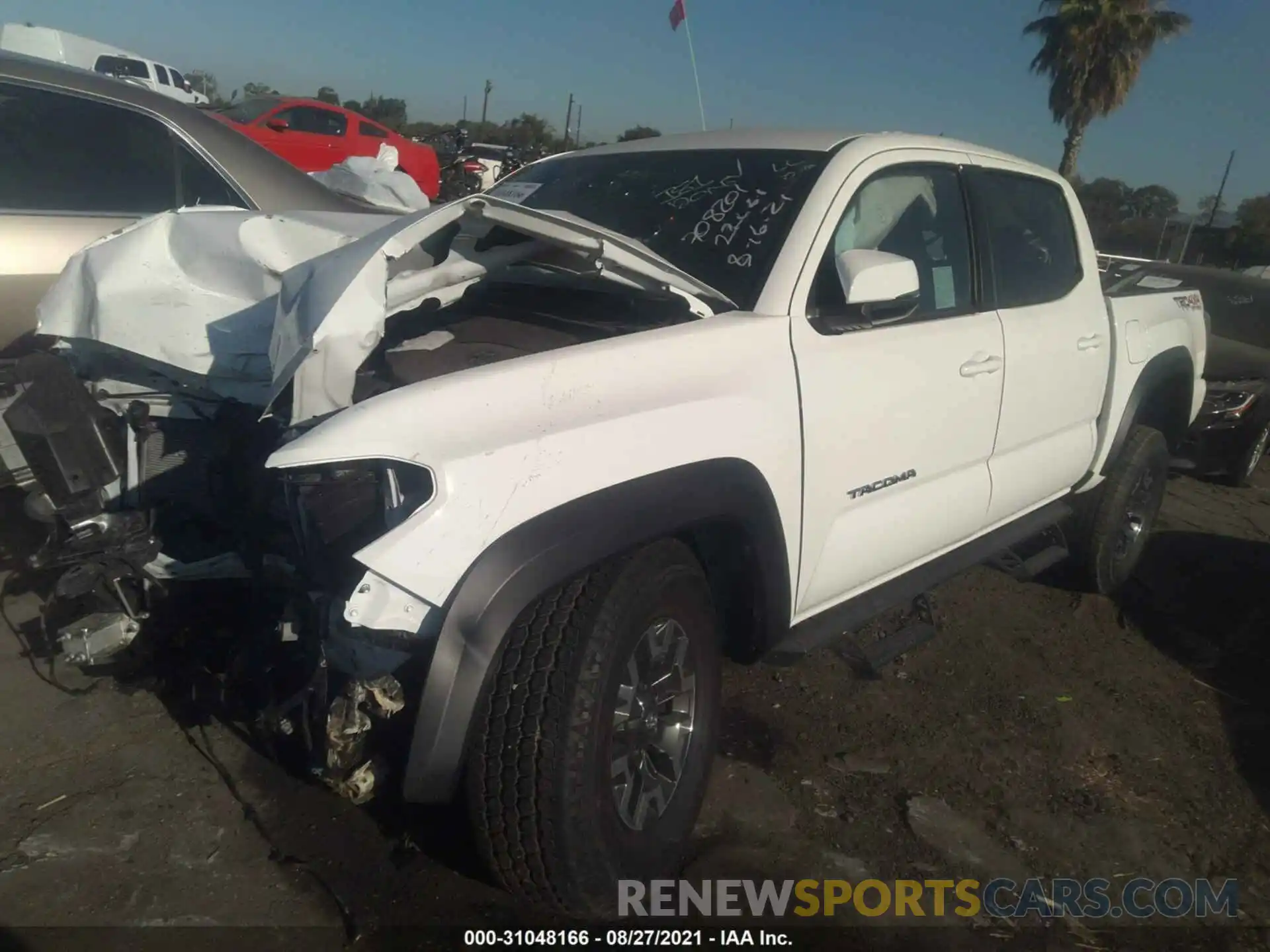 2 Photograph of a damaged car 3TMCZ5AN0MM406714 TOYOTA TACOMA 4WD 2021