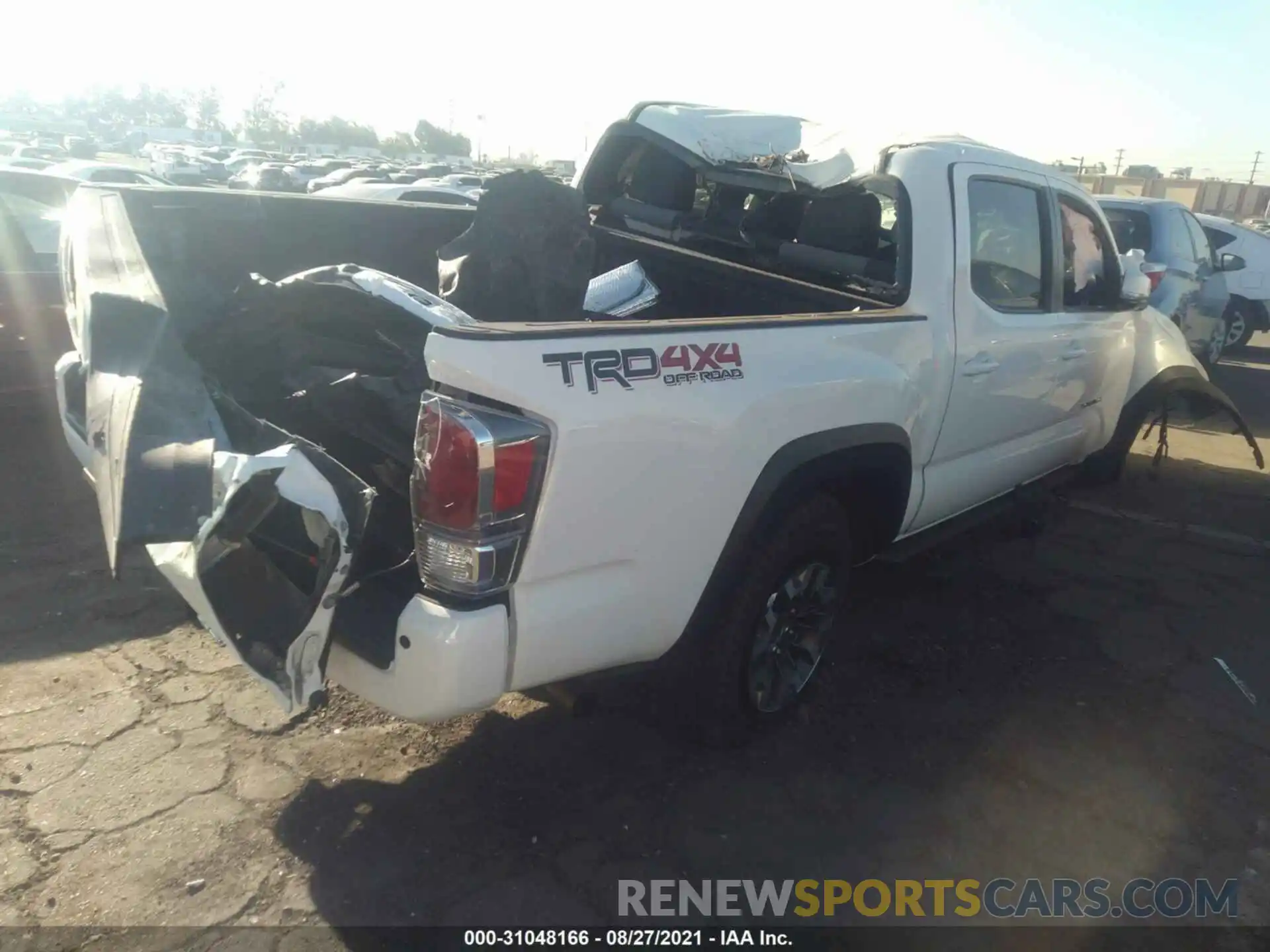 4 Photograph of a damaged car 3TMCZ5AN0MM406714 TOYOTA TACOMA 4WD 2021