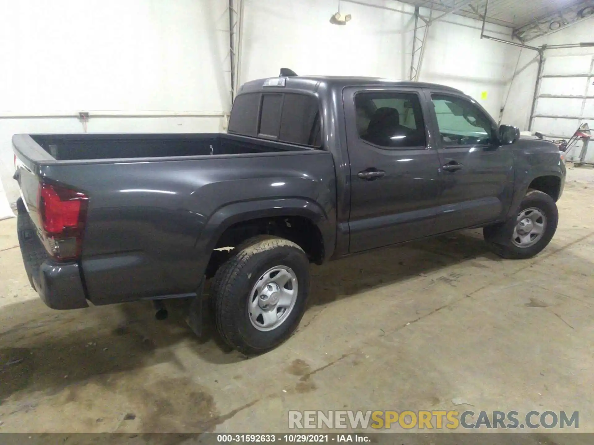 4 Photograph of a damaged car 3TMCZ5AN0MM415977 TOYOTA TACOMA 4WD 2021