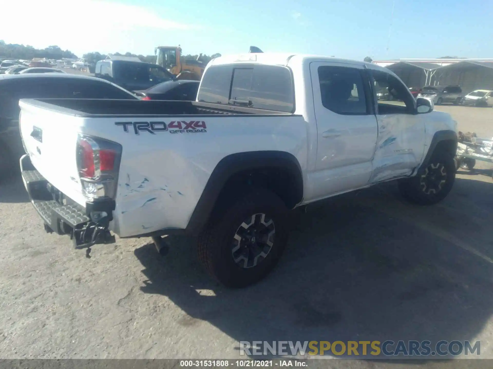 4 Photograph of a damaged car 3TMCZ5AN0MM428275 TOYOTA TACOMA 4WD 2021