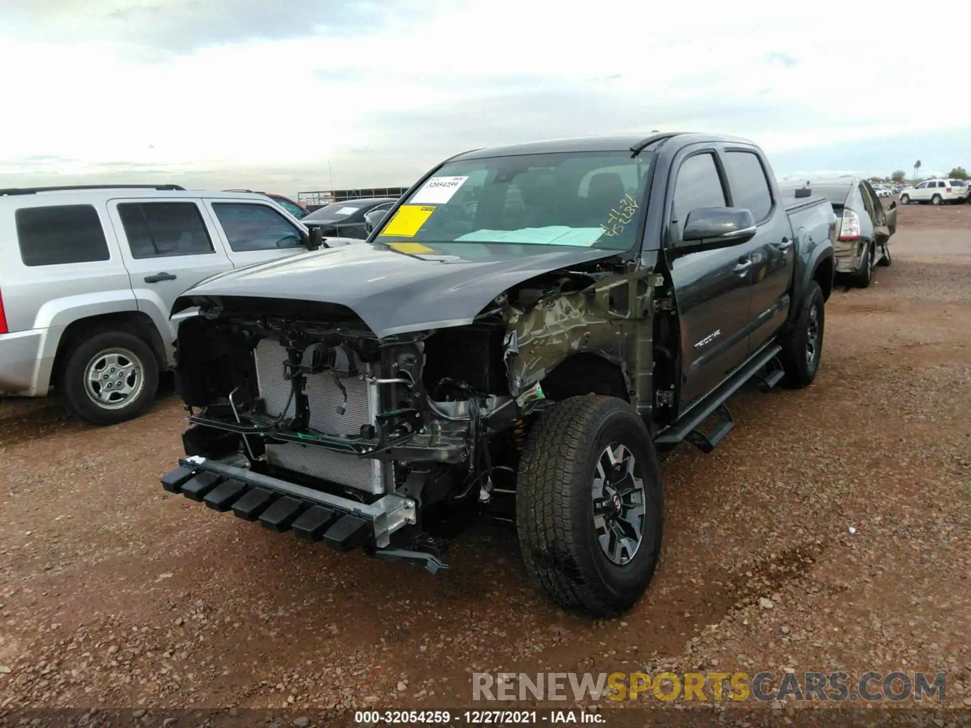 6 Photograph of a damaged car 3TMCZ5AN0MM452284 TOYOTA TACOMA 4WD 2021