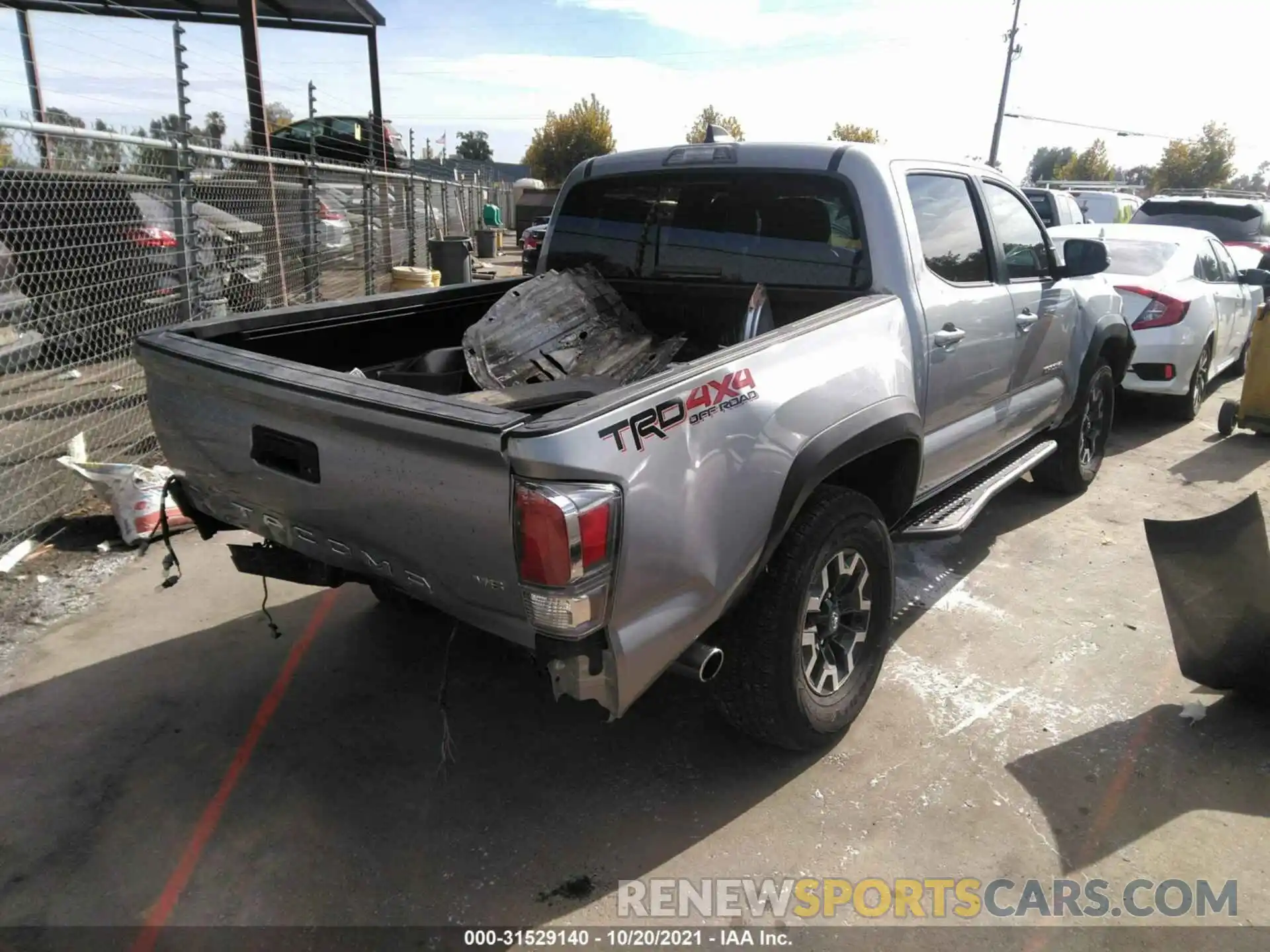 4 Photograph of a damaged car 3TMCZ5AN1MM412585 TOYOTA TACOMA 4WD 2021