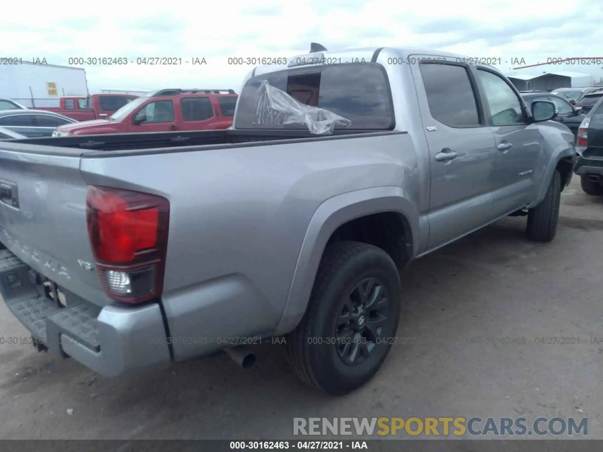 4 Photograph of a damaged car 3TMCZ5AN2MM373294 TOYOTA TACOMA 4WD 2021