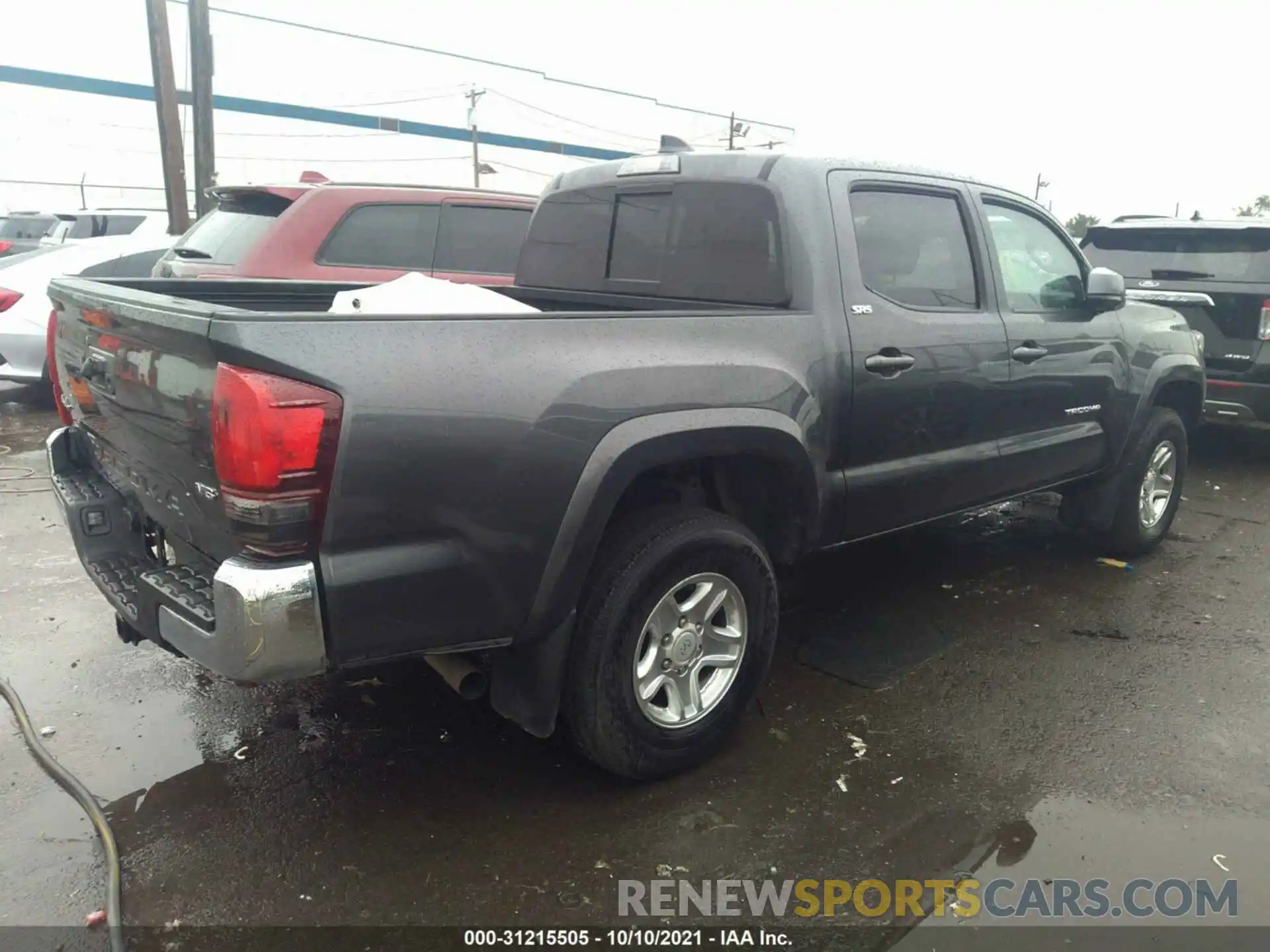 4 Photograph of a damaged car 3TMCZ5AN2MM385946 TOYOTA TACOMA 4WD 2021