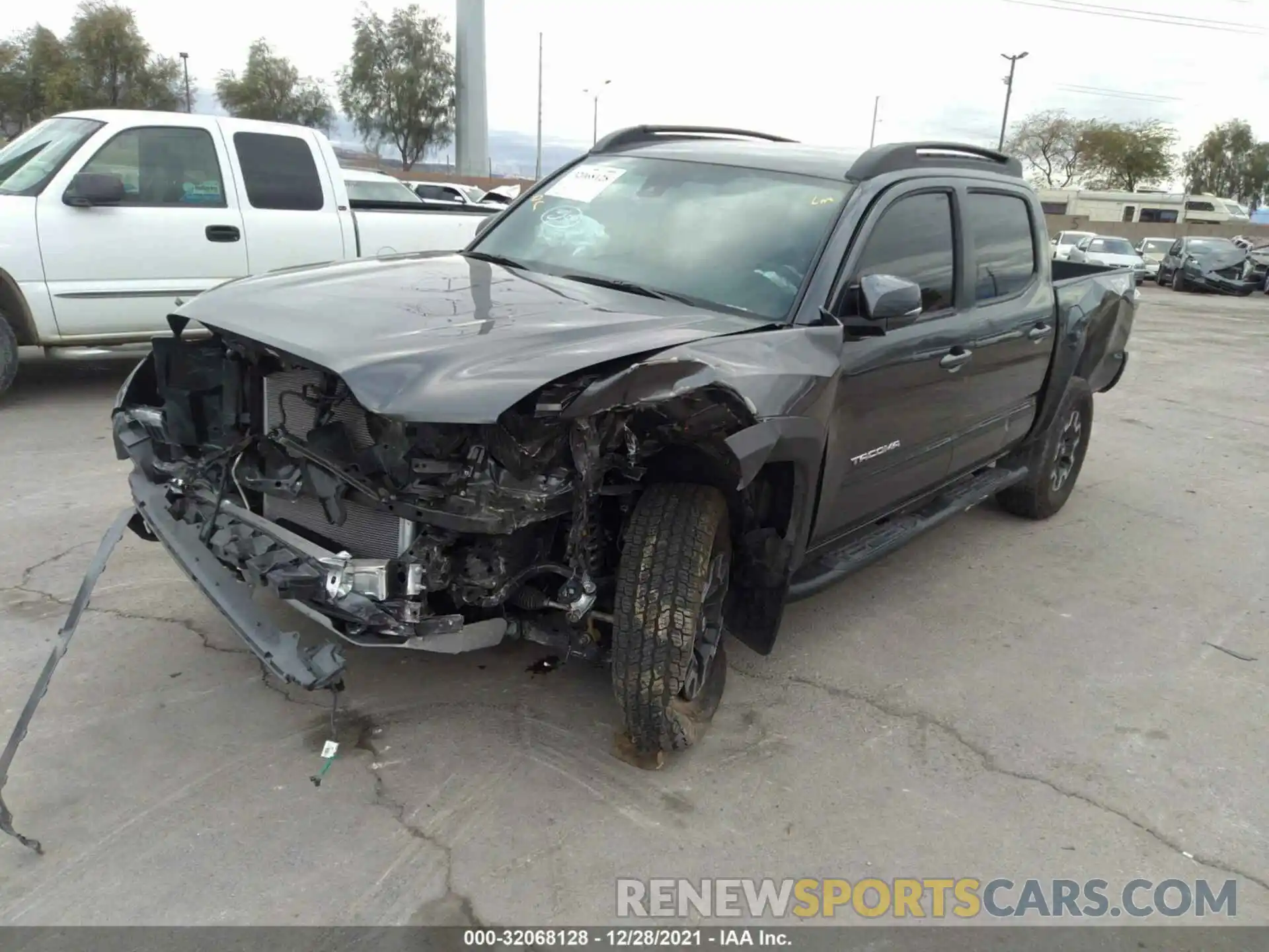 6 Photograph of a damaged car 3TMCZ5AN2MM397594 TOYOTA TACOMA 4WD 2021