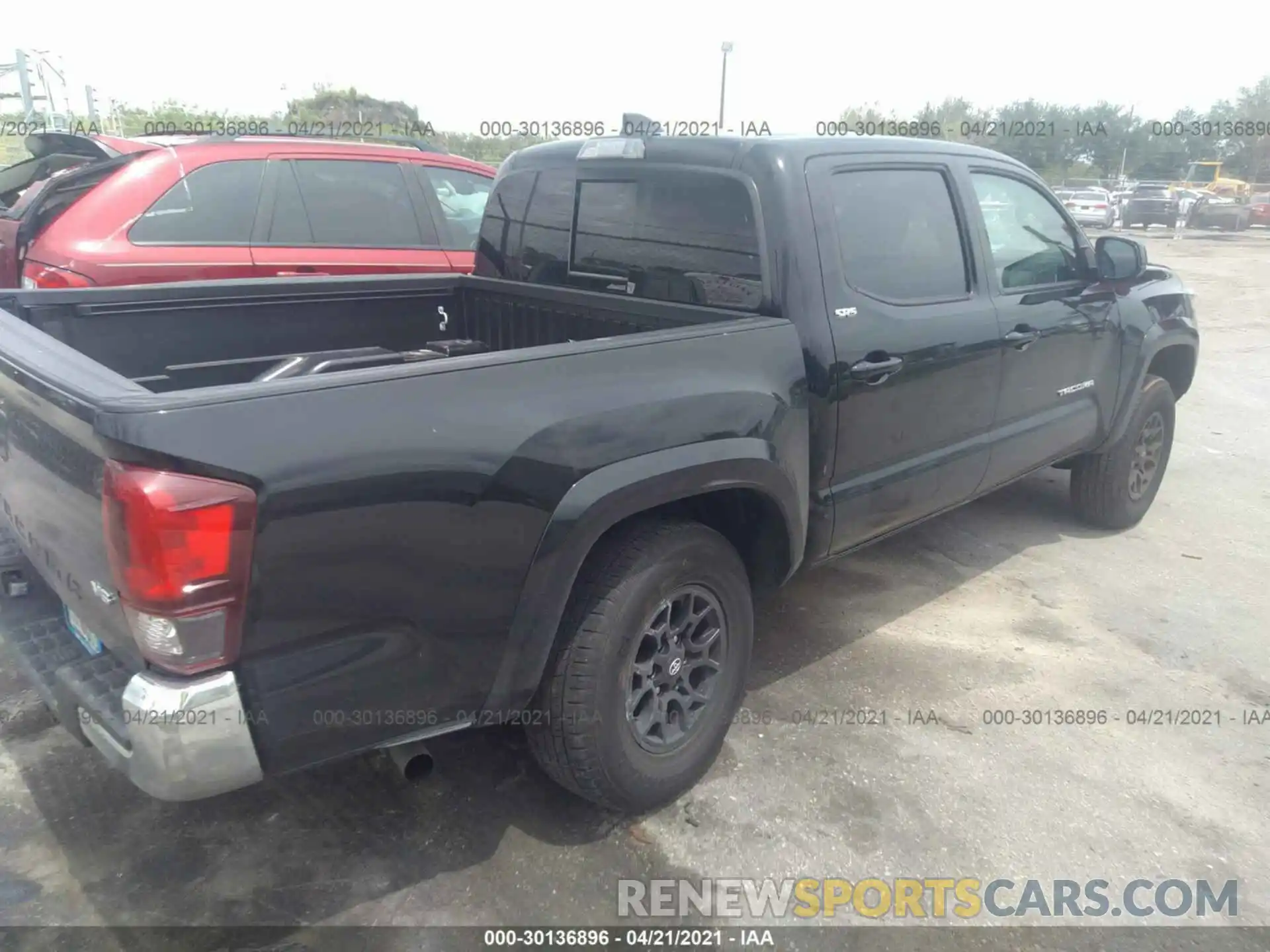 4 Photograph of a damaged car 3TMCZ5AN3MM395465 TOYOTA TACOMA 4WD 2021