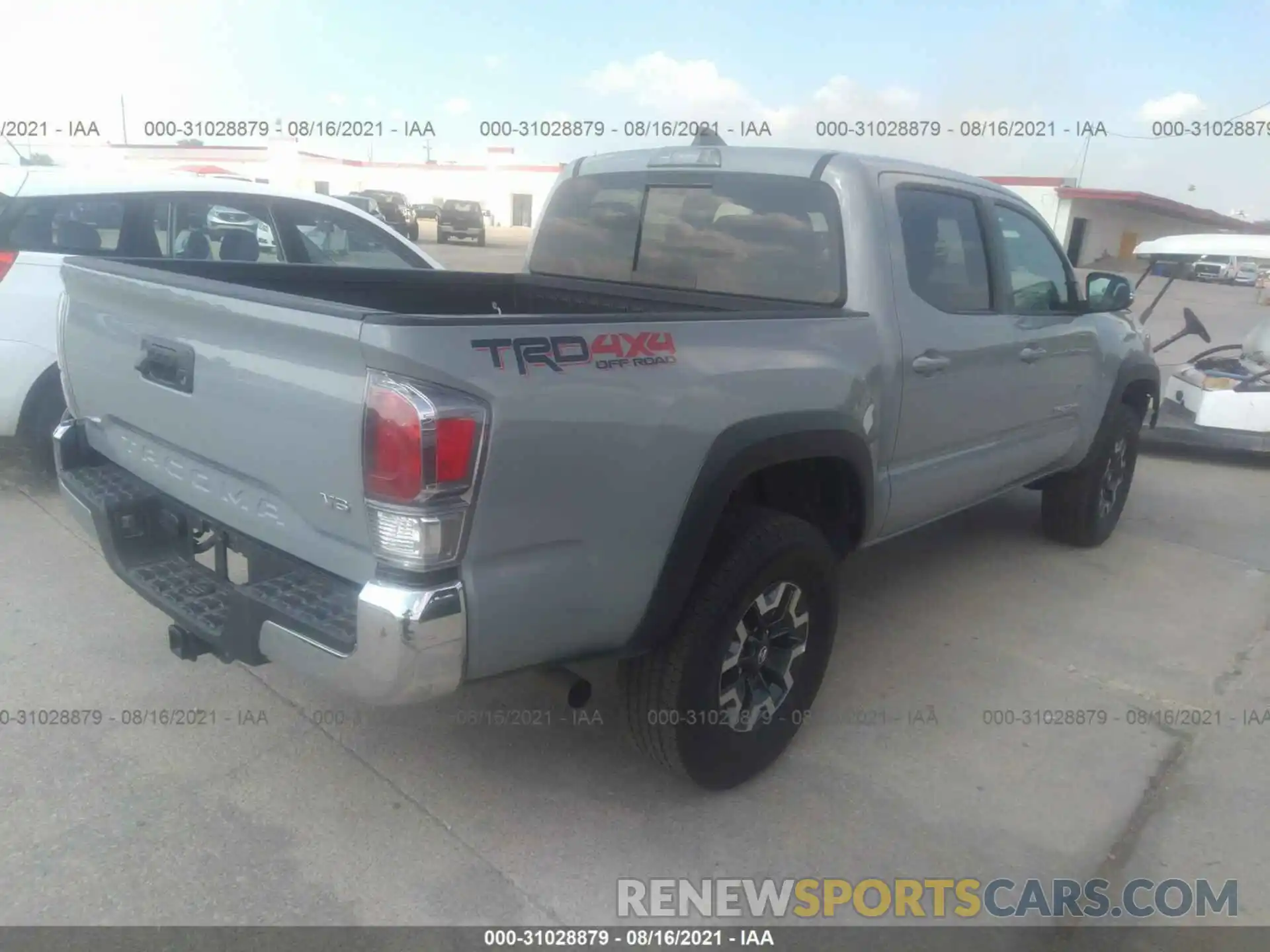 4 Photograph of a damaged car 3TMCZ5AN4MM408742 TOYOTA TACOMA 4WD 2021