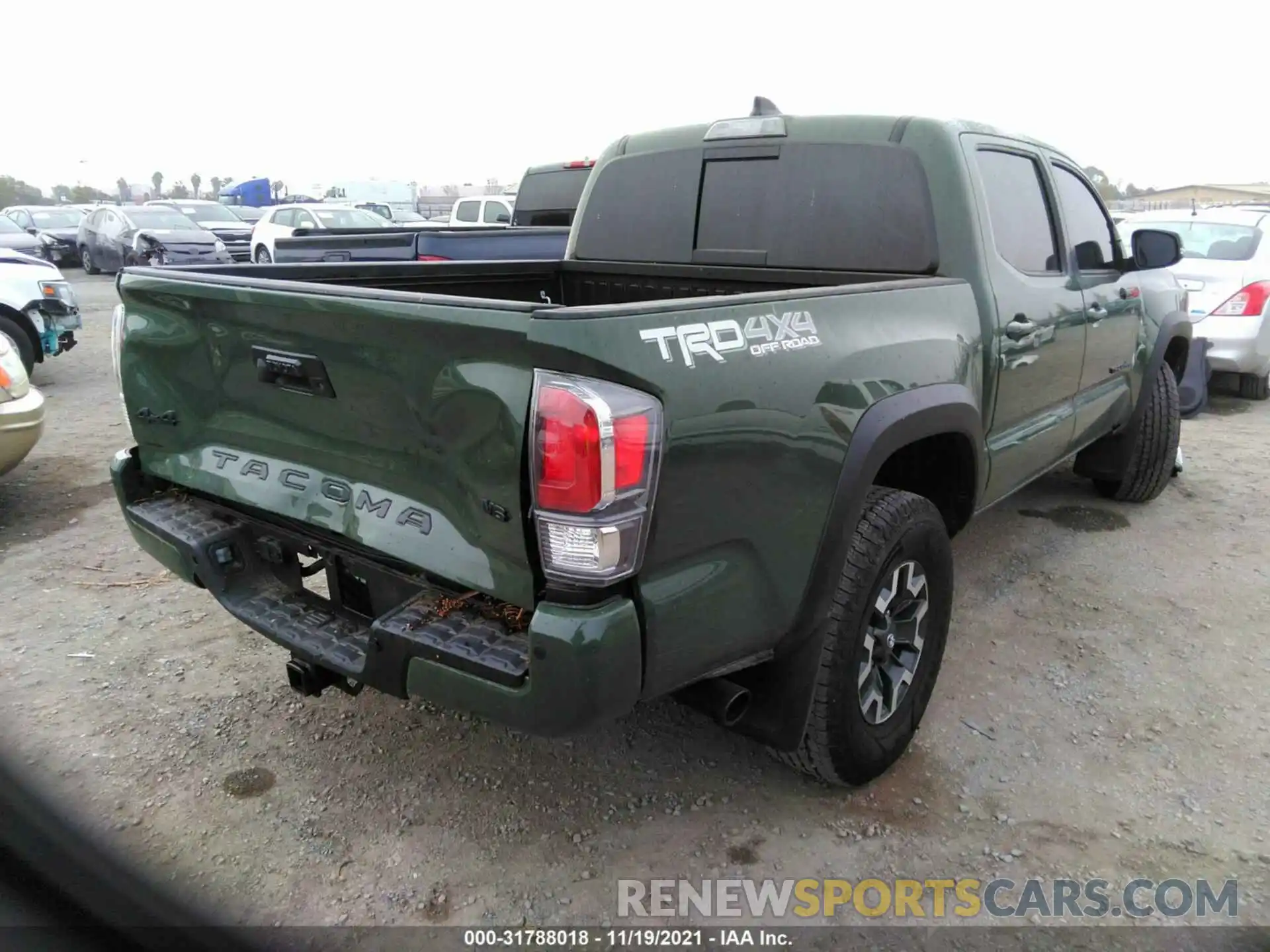 4 Photograph of a damaged car 3TMCZ5AN4MM413035 TOYOTA TACOMA 4WD 2021