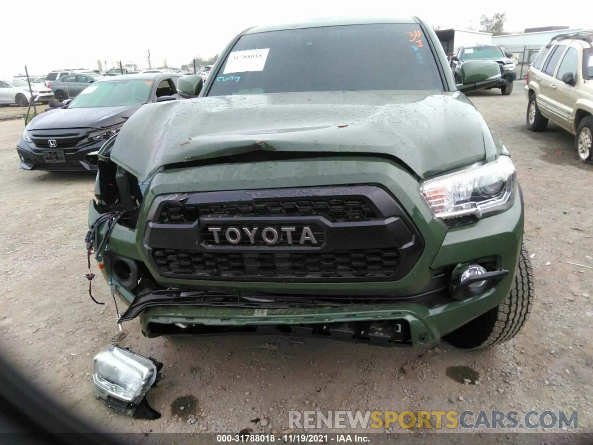 6 Photograph of a damaged car 3TMCZ5AN4MM413035 TOYOTA TACOMA 4WD 2021