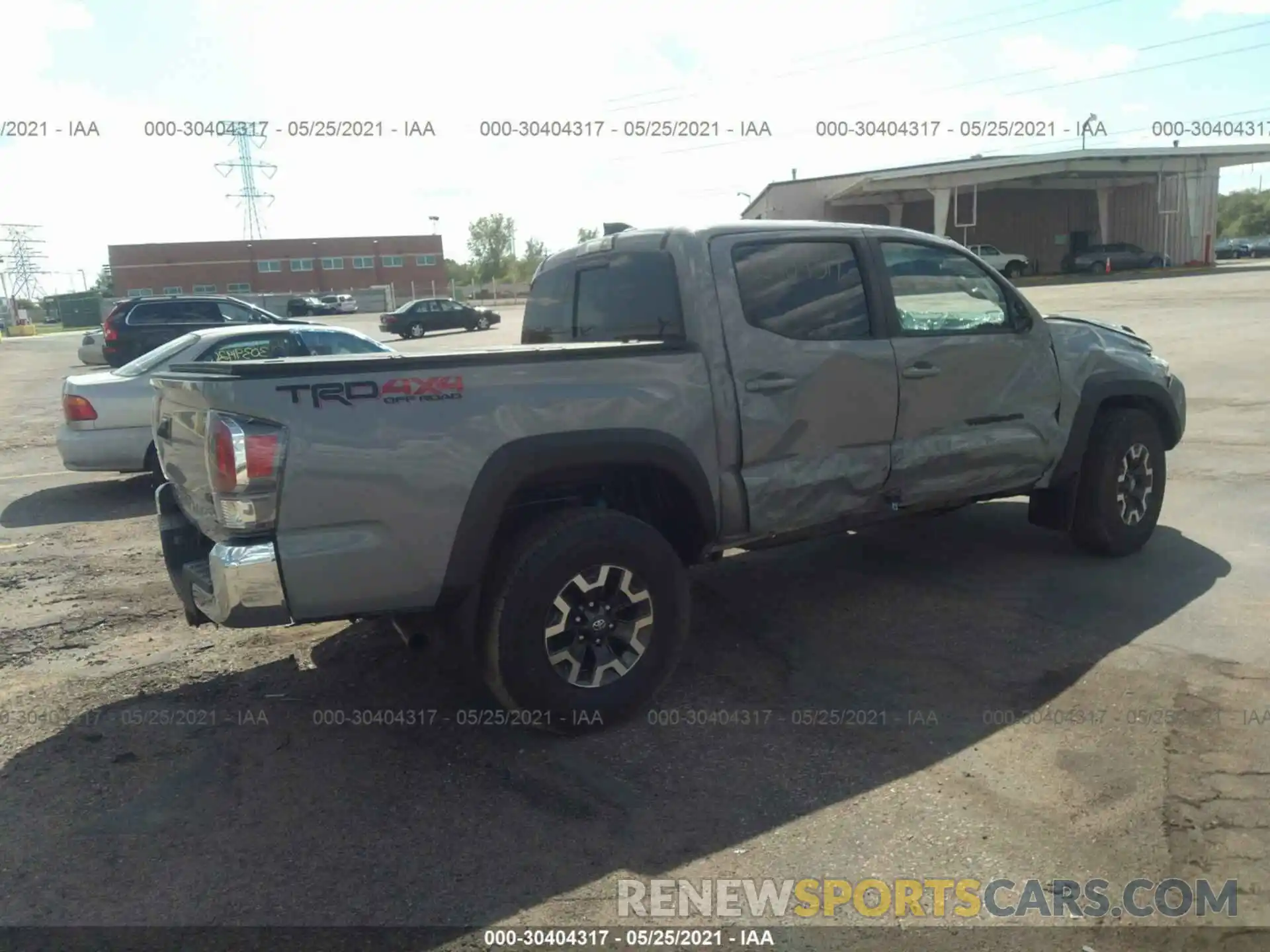 4 Photograph of a damaged car 3TMCZ5AN4MM415710 TOYOTA TACOMA 4WD 2021