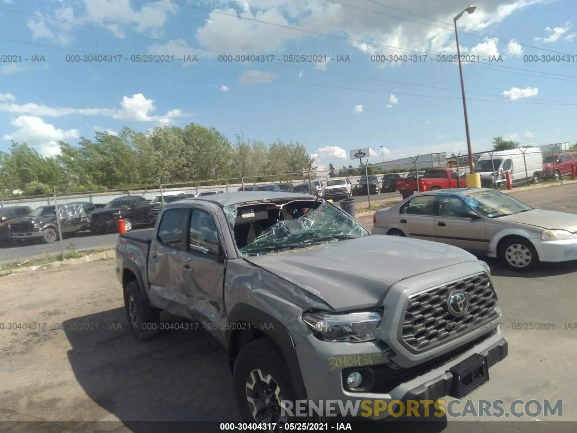 6 Photograph of a damaged car 3TMCZ5AN4MM415710 TOYOTA TACOMA 4WD 2021