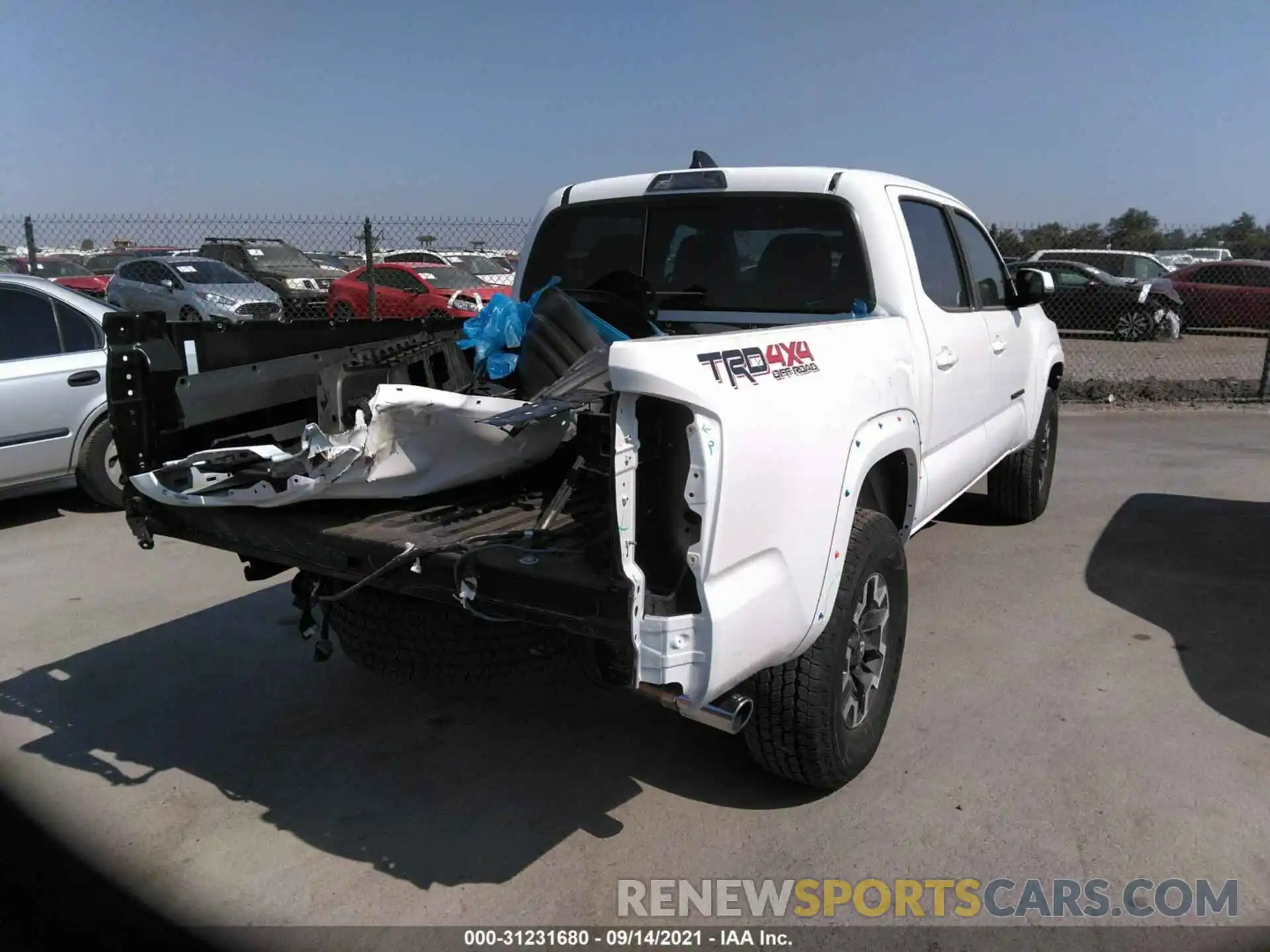 4 Photograph of a damaged car 3TMCZ5AN4MM435164 TOYOTA TACOMA 4WD 2021